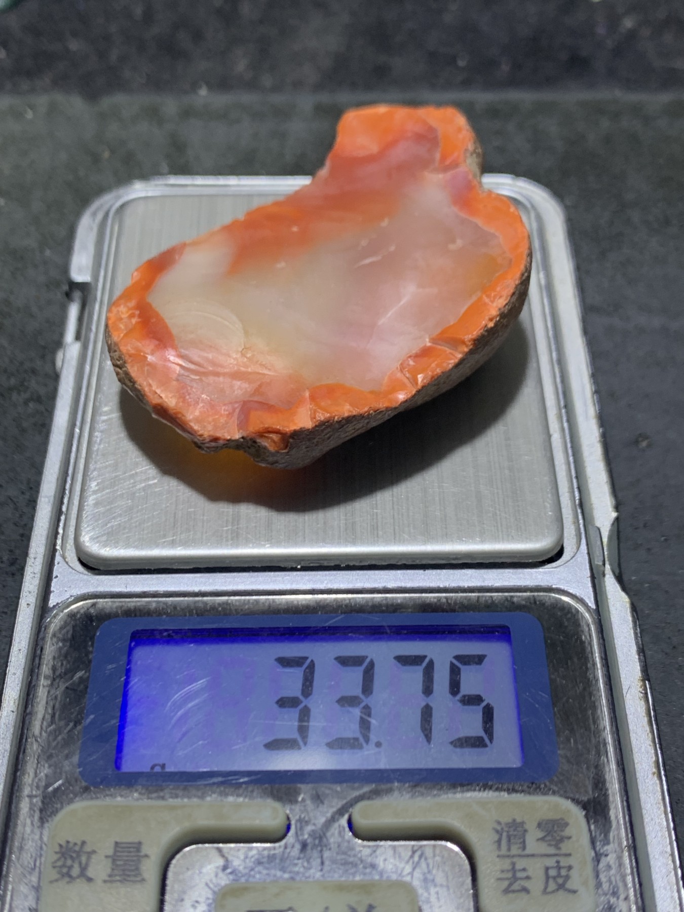 精美荔枝冻飘柿子红原皮南红玛瑙明料原石一颗，
