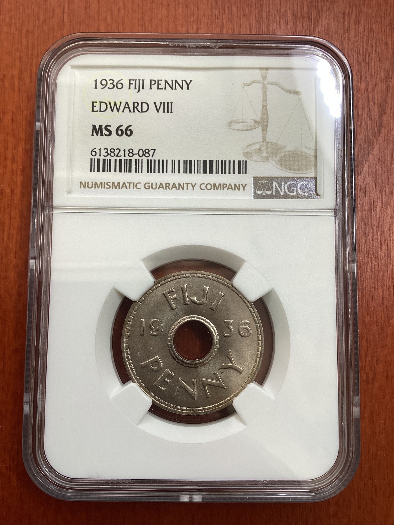 长老汇龙年精选第四场 1936 斐济爱德华八世1便士中孔镍币，NGC MS66分，亚军分，更高分仅有5枚。独年份，爱八当年逊位，发行量非常少。非后铸。