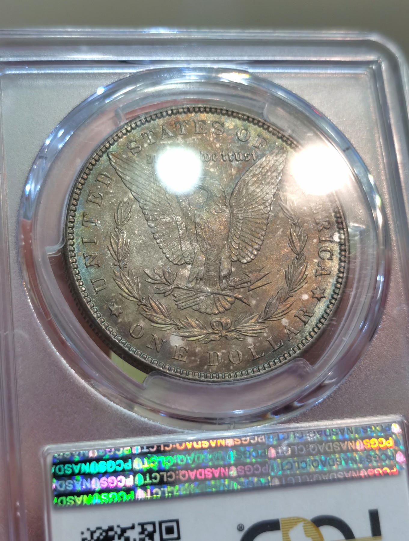 博洋堂世界钱币拍卖第086期（全场包邮） PCGS MS64 美国1887年P版摩根银币，双面绚丽五彩包浆，彩浆层次分明，3号段老盒严评