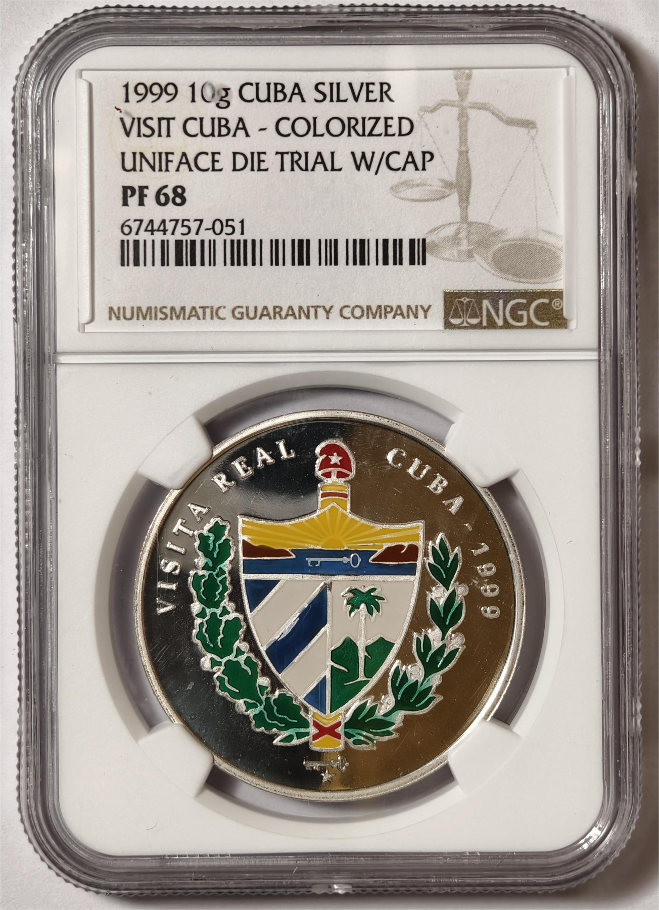 紫瑗钱币——第338期拍卖 古巴 1999年 西班牙皇室访问古巴 10克 彩色国旗章  NGC PR68