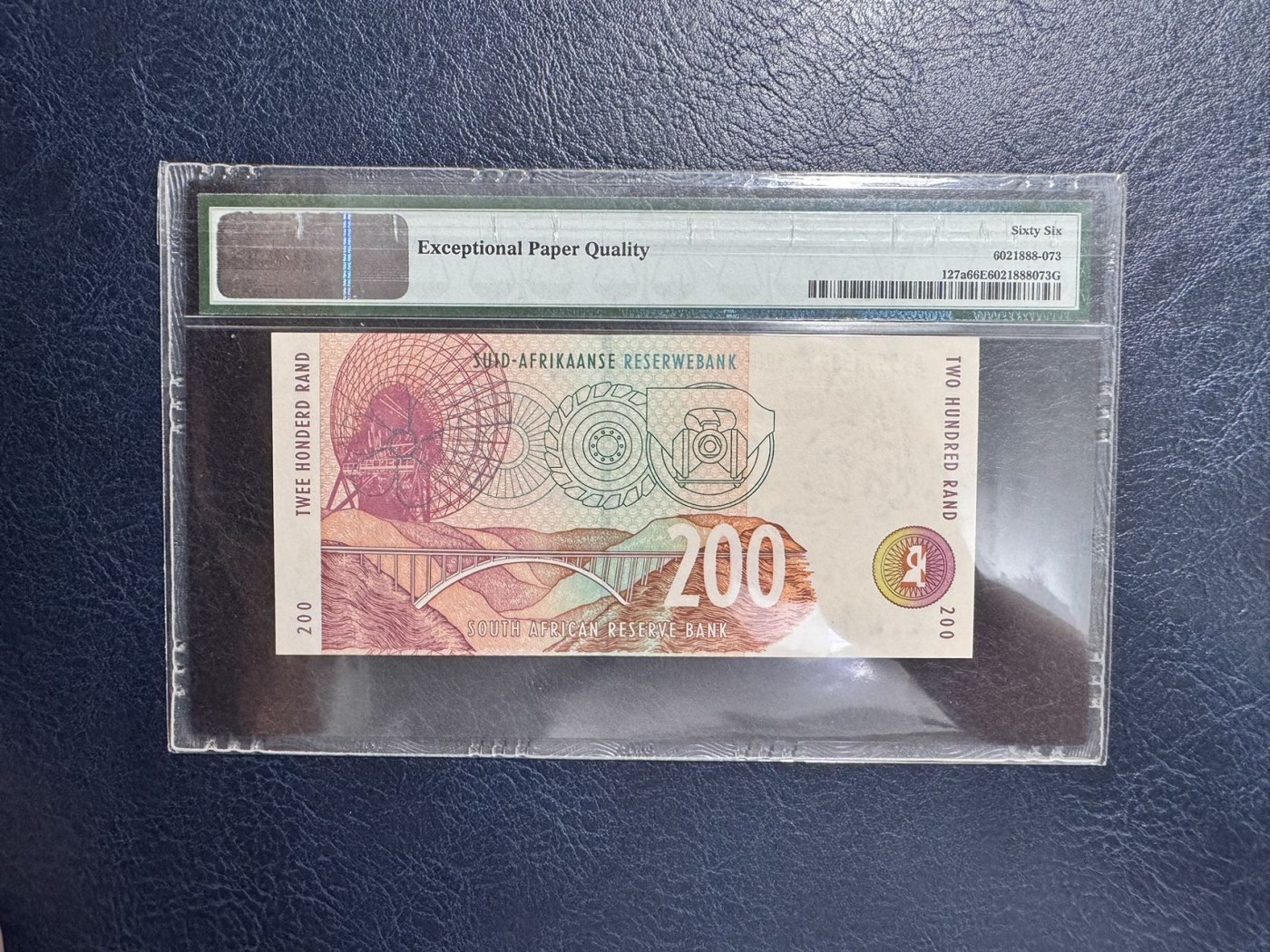 收藏联盟Quantum Auction 第338期拍卖  南非1994年200兰特 PMG67 花豹 号码无47