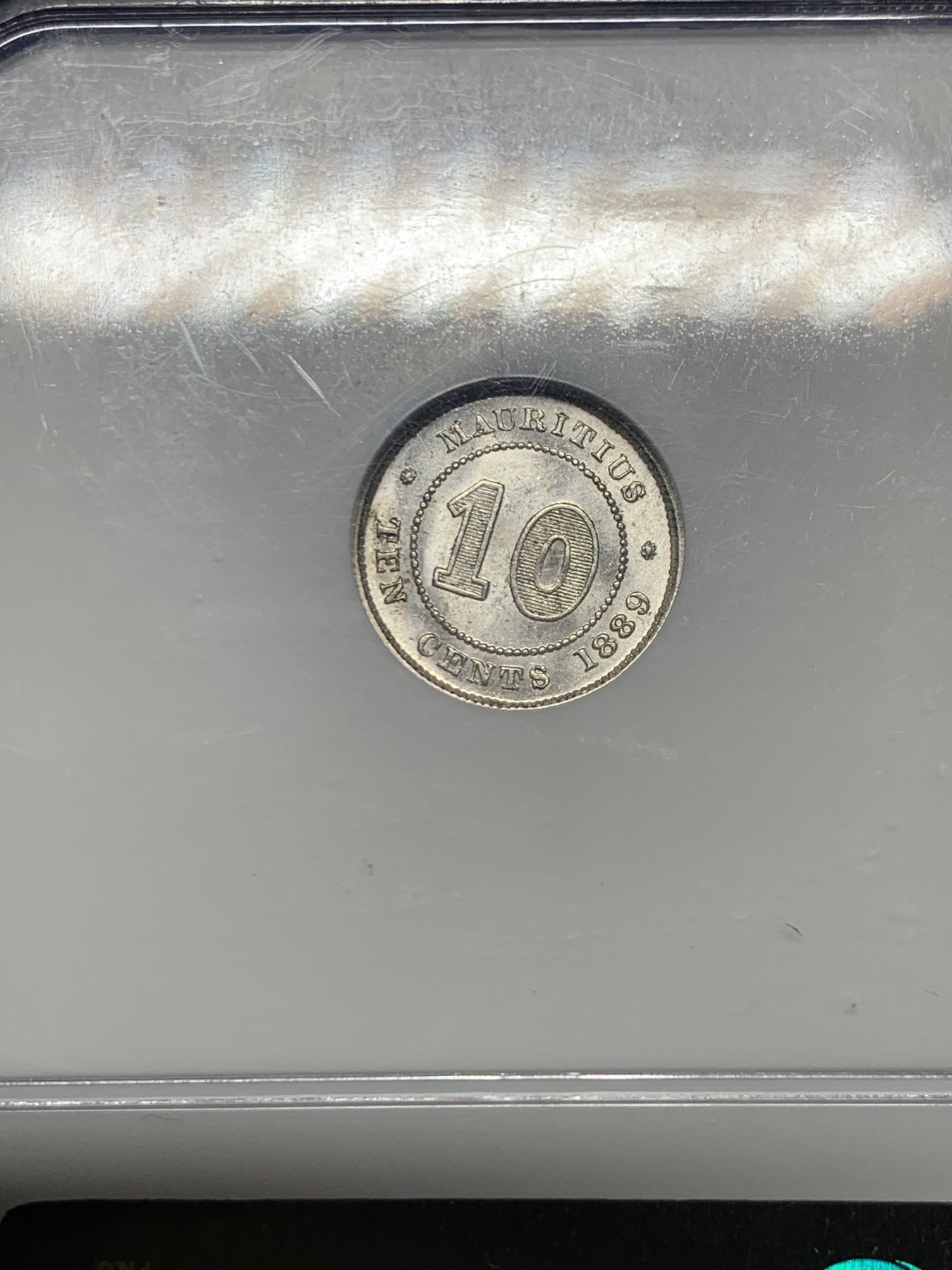 《竞宝斋》第259场-周日，周一 2场连拍 (全场包邮) NGC MS64 英属毛里求斯1889H年10分银币