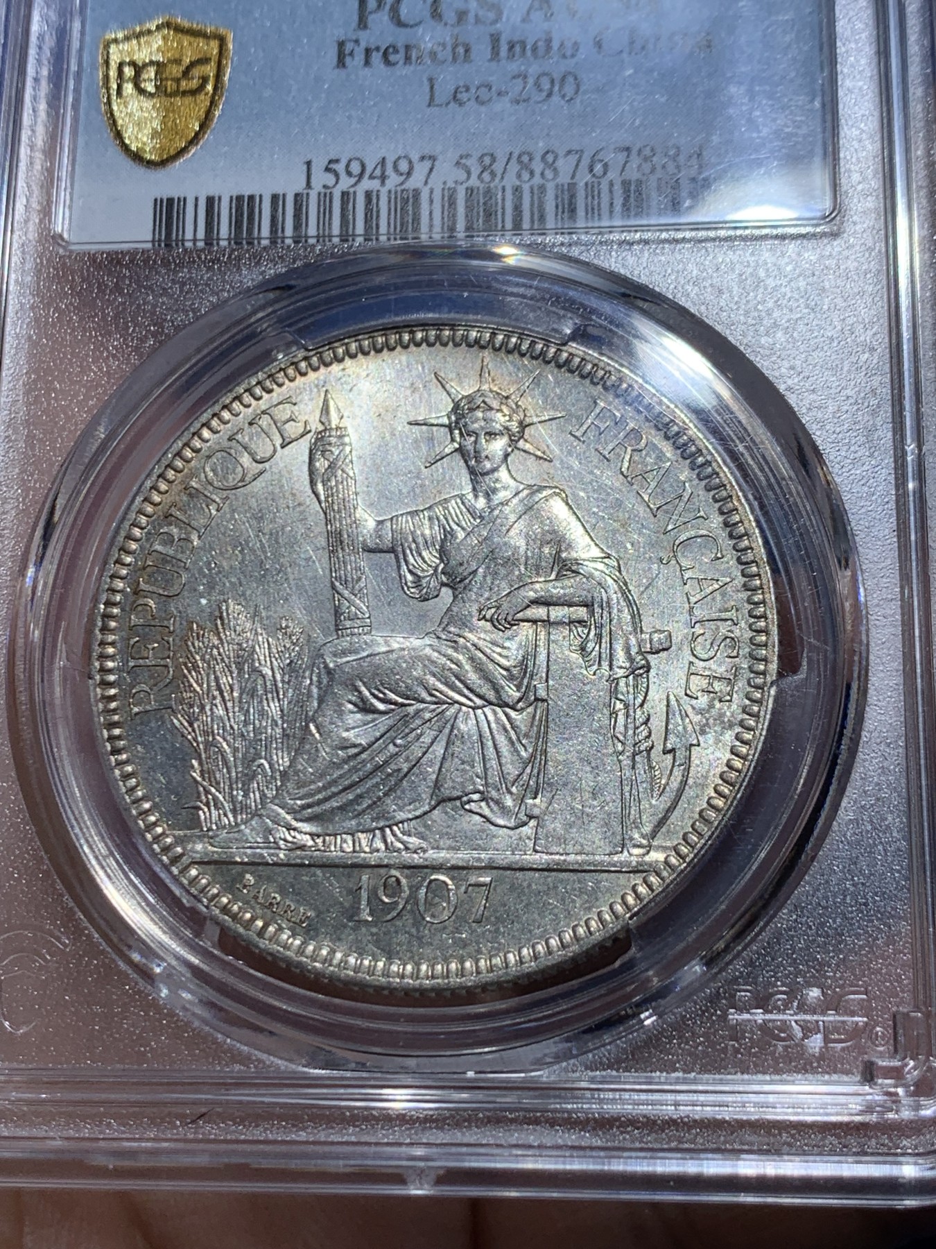 《竞宝斋》第259场-周日，周一 2场连拍 (全场包邮) PCGS AU58 法属印支1907A坐洋1P大银币，面部细节完整，砸盒重评后UNC变成了au。
