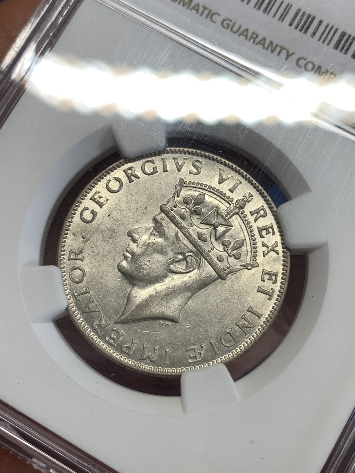 《竞宝斋》第259场-周日，周一 2场连拍 (全场包邮) NGC AU58 英属东非 1941年 1先令 银币