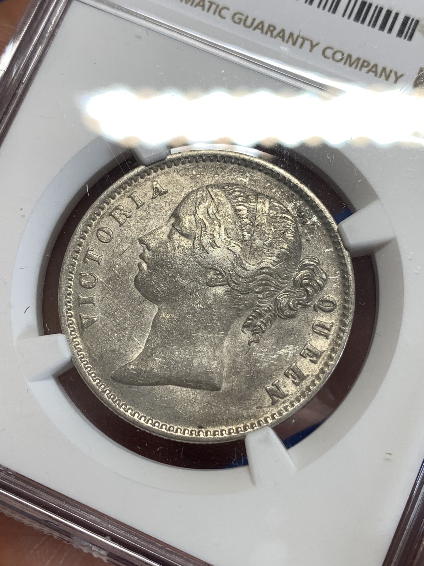 《竞宝斋》第259场-周日，周一 2场连拍 (全场包邮) NGC AU50 英属印度1840年维多利亚女王双辫版1卢比银币