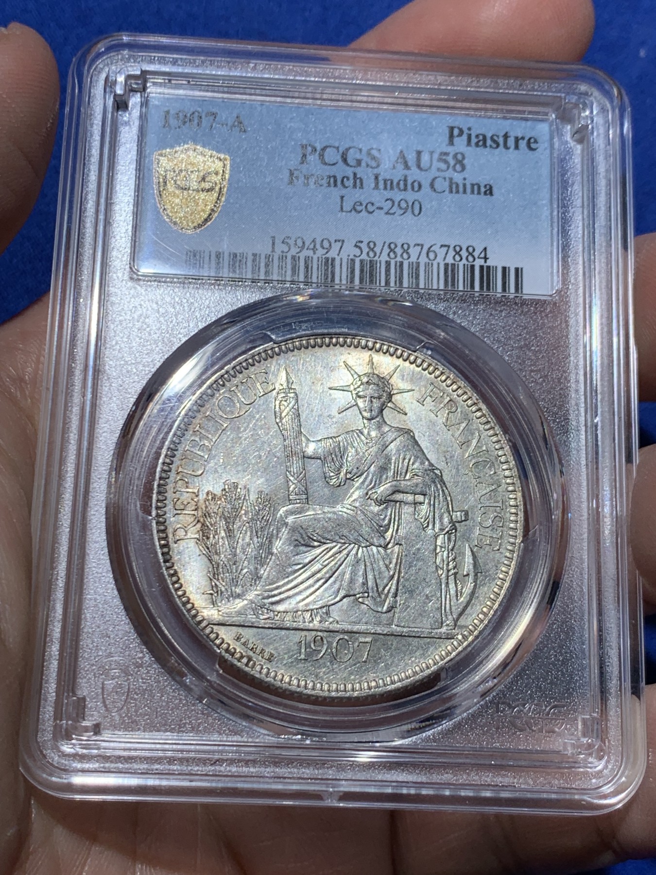 《竞宝斋》第259场-周日，周一 2场连拍 (全场包邮) PCGS AU58 法属印支1907A坐洋1P大银币，面部细节完整，砸盒重评后UNC变成了au。