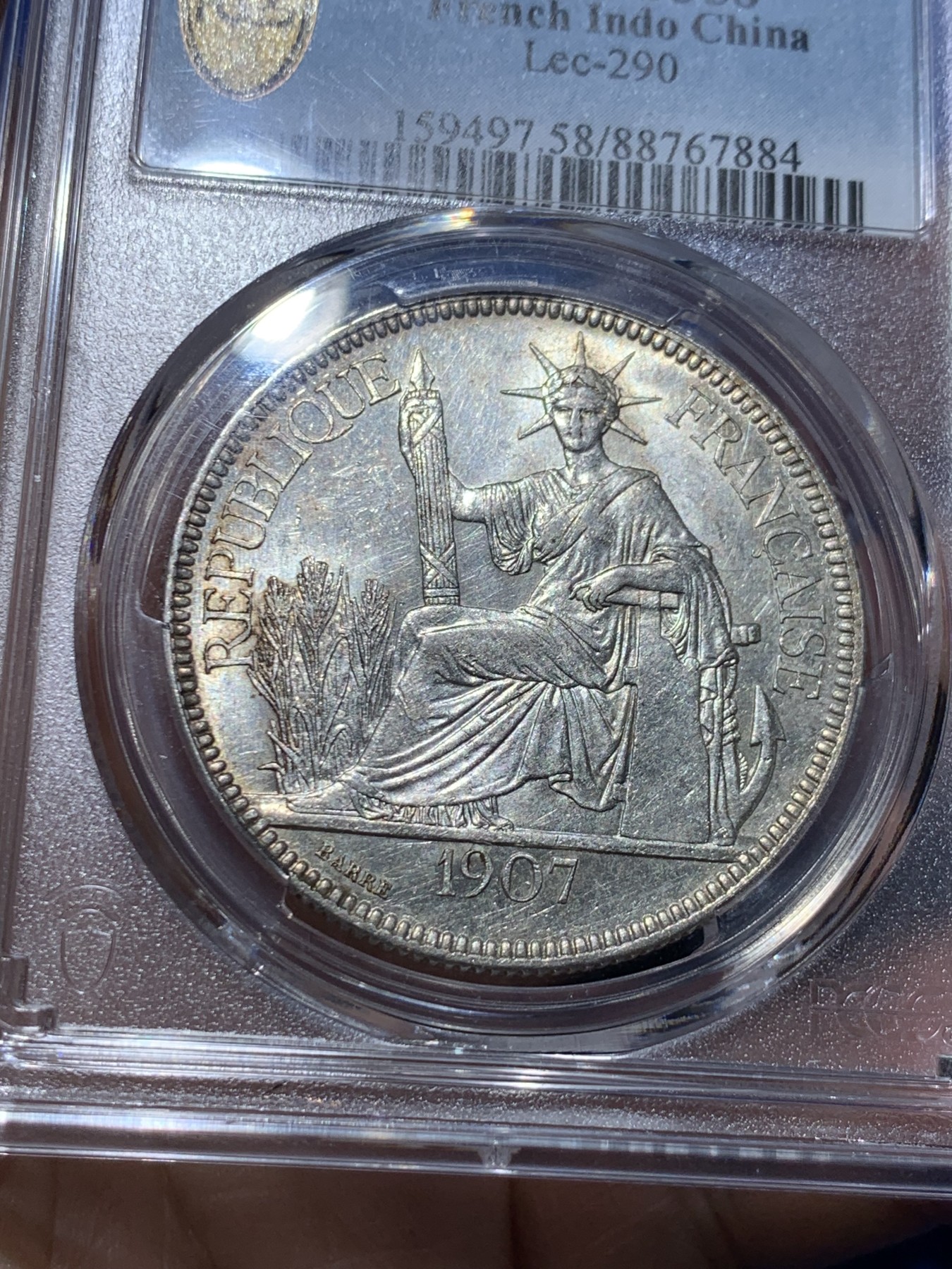 《竞宝斋》第259场-周日，周一 2场连拍 (全场包邮) PCGS AU58 法属印支1907A坐洋1P大银币，面部细节完整，砸盒重评后UNC变成了au。