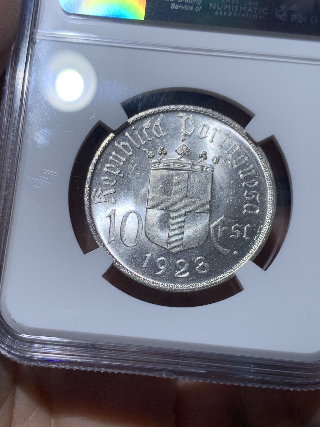 《竞宝斋》第259场-周日，周一 2场连拍 (全场包邮) NGC MS64 葡萄牙1928年奥里基战役10埃斯库多纪念银币，打制精美，状态极佳。