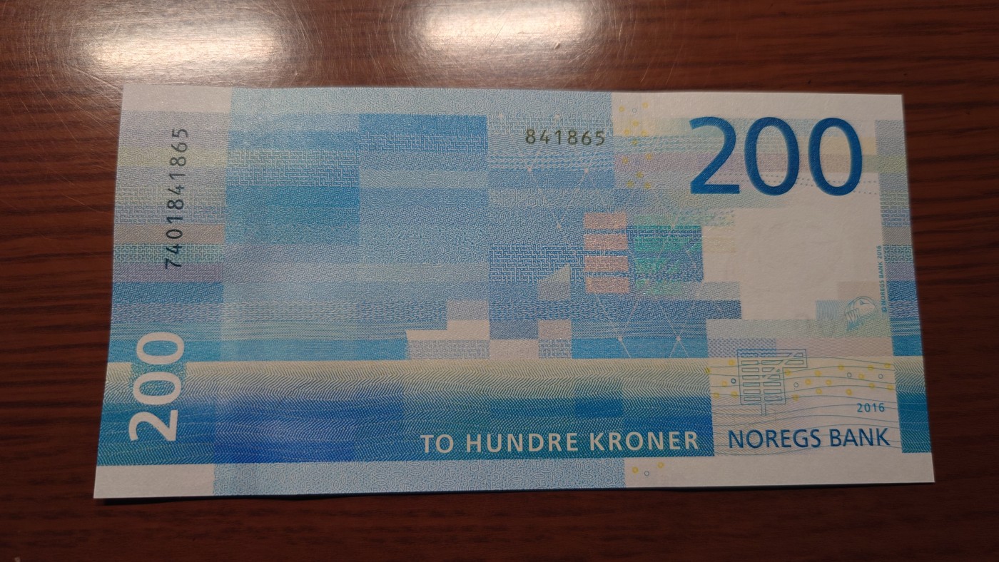 【世界钱币】精选微拍第101期暨2024年第12期  部分卖剩的新品裸钞评级币展销 2016年挪威200克朗 全新绝品尾号865