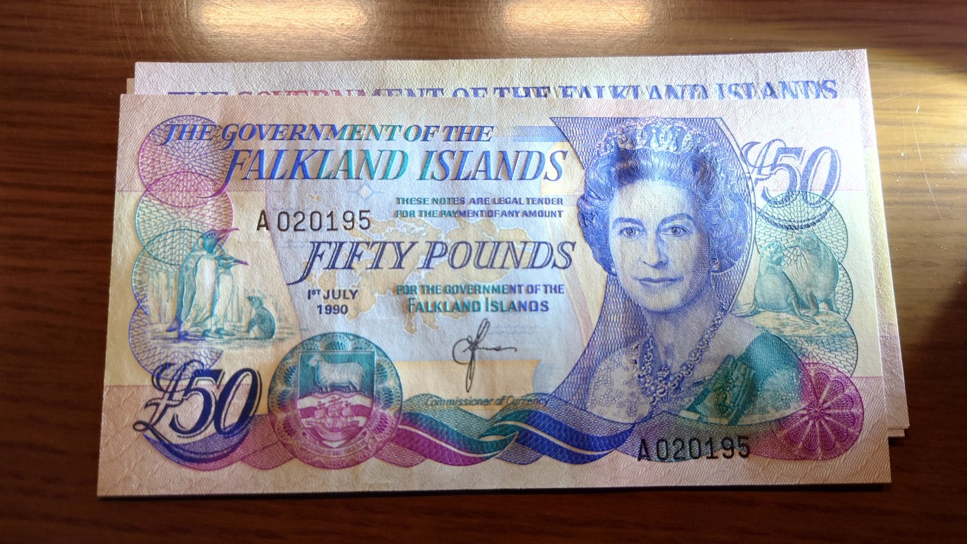 【世界钱币】精选微拍第101期暨2024年第12期  部分卖剩的新品裸钞评级币展销 1990年福克兰群岛50元 全新绝品无47尾号195