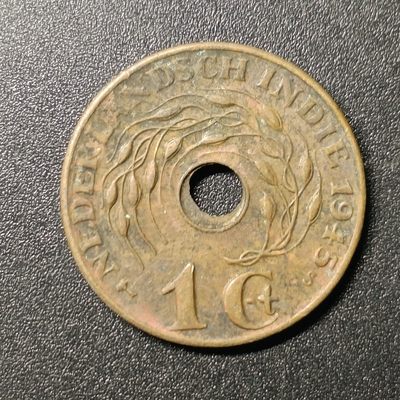 ↓君缘收藏67期☞钱币邮品↓无佣金、可寄存、满10元包邮  - 荷属东印度1945年1分 中孔异形黄铜币