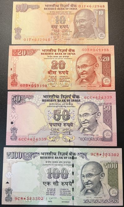 珑诚汇（原乐淘淘）世界纸币拍卖 第四期 裸钞场 - 印度2011-22年纸币四张 稀少补号 100卢比左下角角折 10、20有荧光斑 UNC
