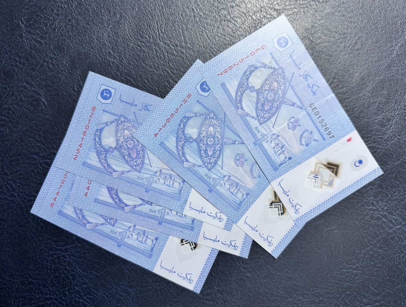 收藏联盟Quantum Auction 第340期拍卖  马来西亚1吉令特5张和5吉令特5张 品相分别为XF和全新UNC