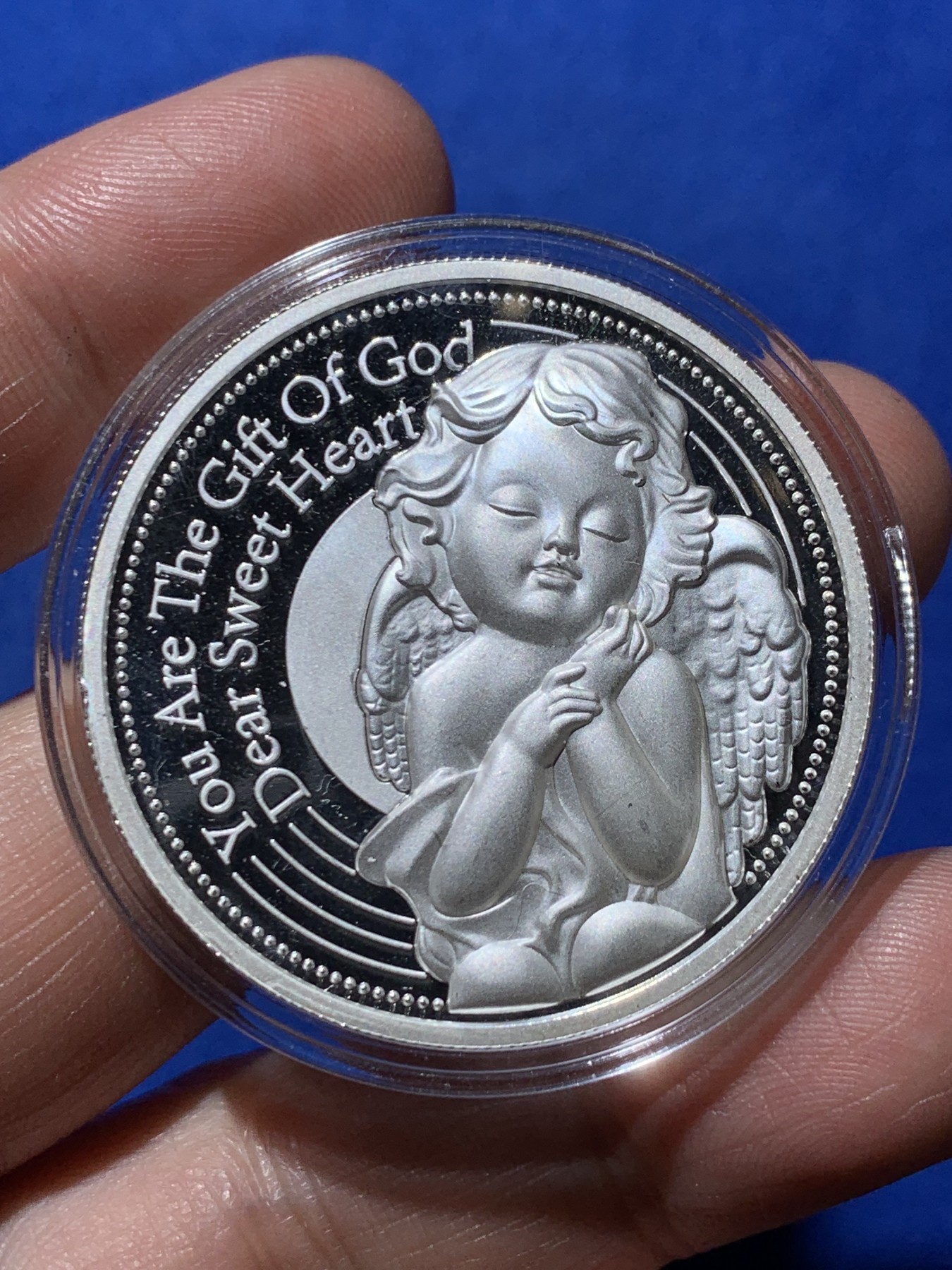 《竞宝斋》第260场-周日，周一，周二 3场连拍 (全场包邮) 天使宝宝银质纪念章 约30.3克 密度约10.4