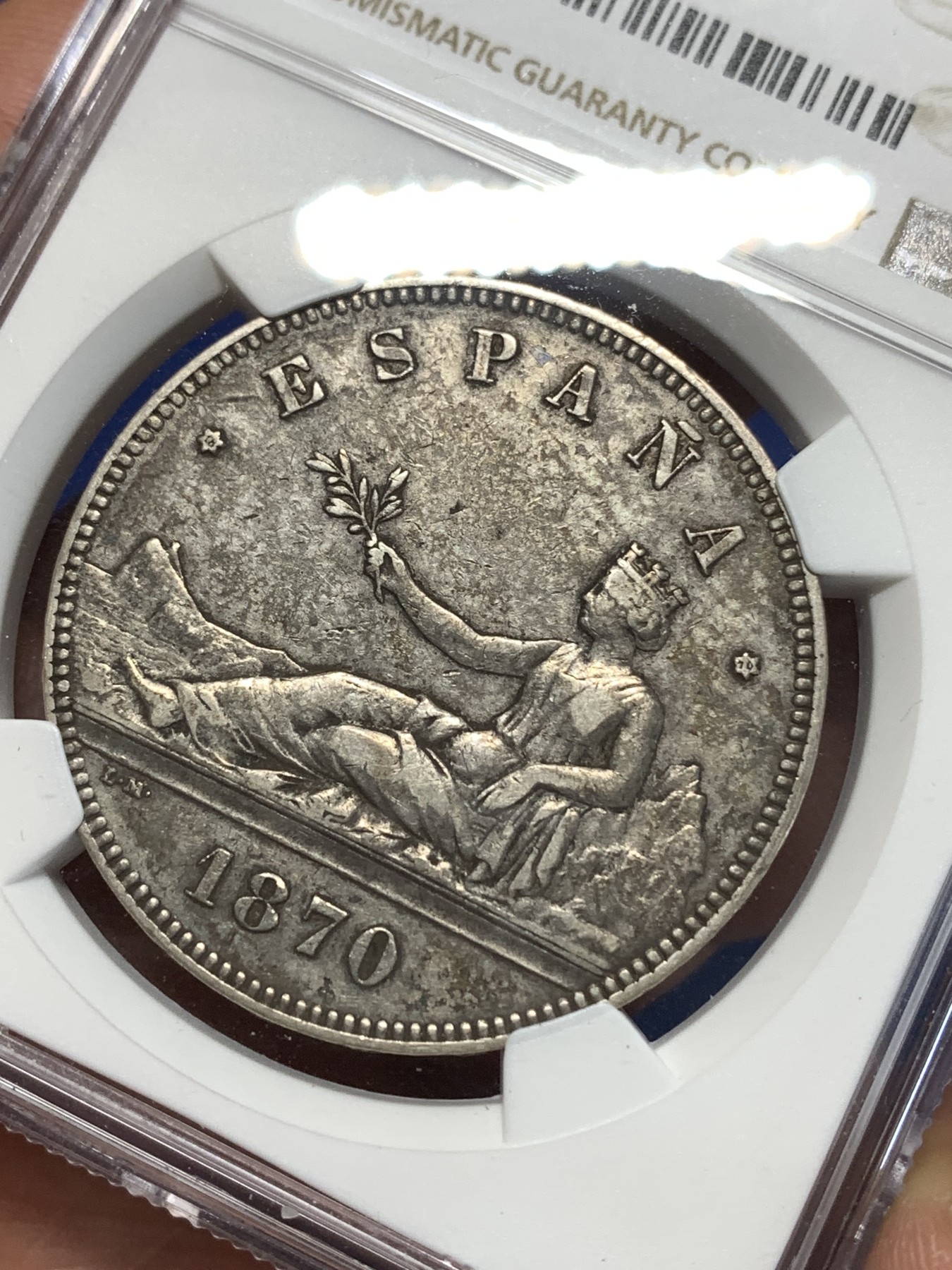 《竞宝斋》第260场-周日，周一，周二 3场连拍 (全场包邮) NGC XF45 西班牙1870年坐人拿花5比塞塔双柱银币