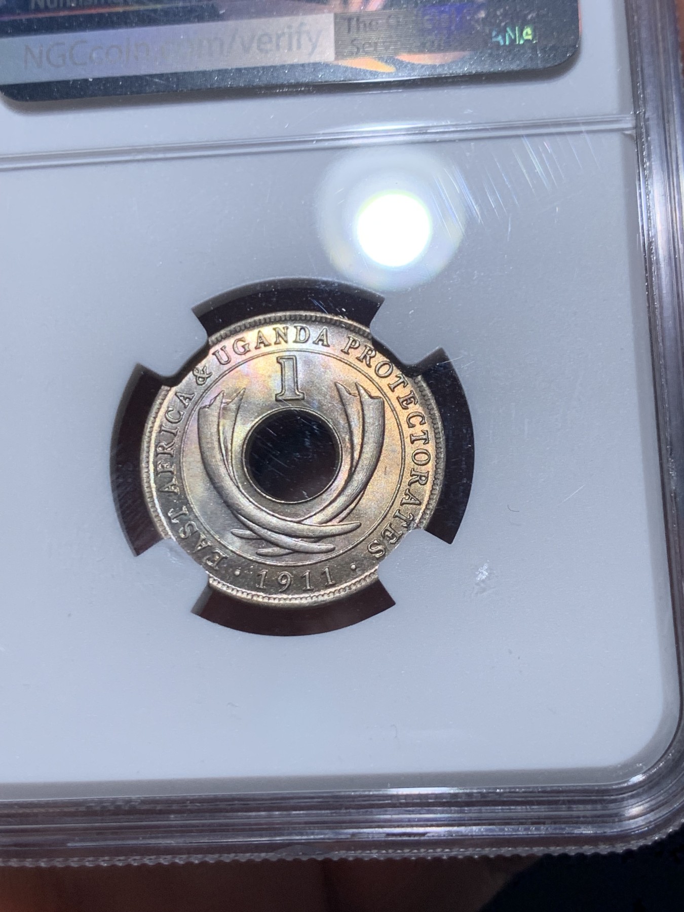 《竞宝斋》第260场-周日，周一，周二 3场连拍 (全场包邮) 两枚一组 NGC MS63/MS64RB 英属东非1911/1961年1分中孔币，从乔治五世东非乌干达保护地到伊丽莎白二世东非殖民地，相隔半个世纪的相遇