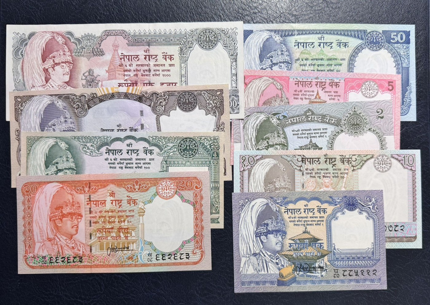 收藏联盟Quantum Auction 第340期拍卖  尼泊尔1981-2001年1到1000卢比 品相UNC 瑕疵细节如图 500有紫光斑