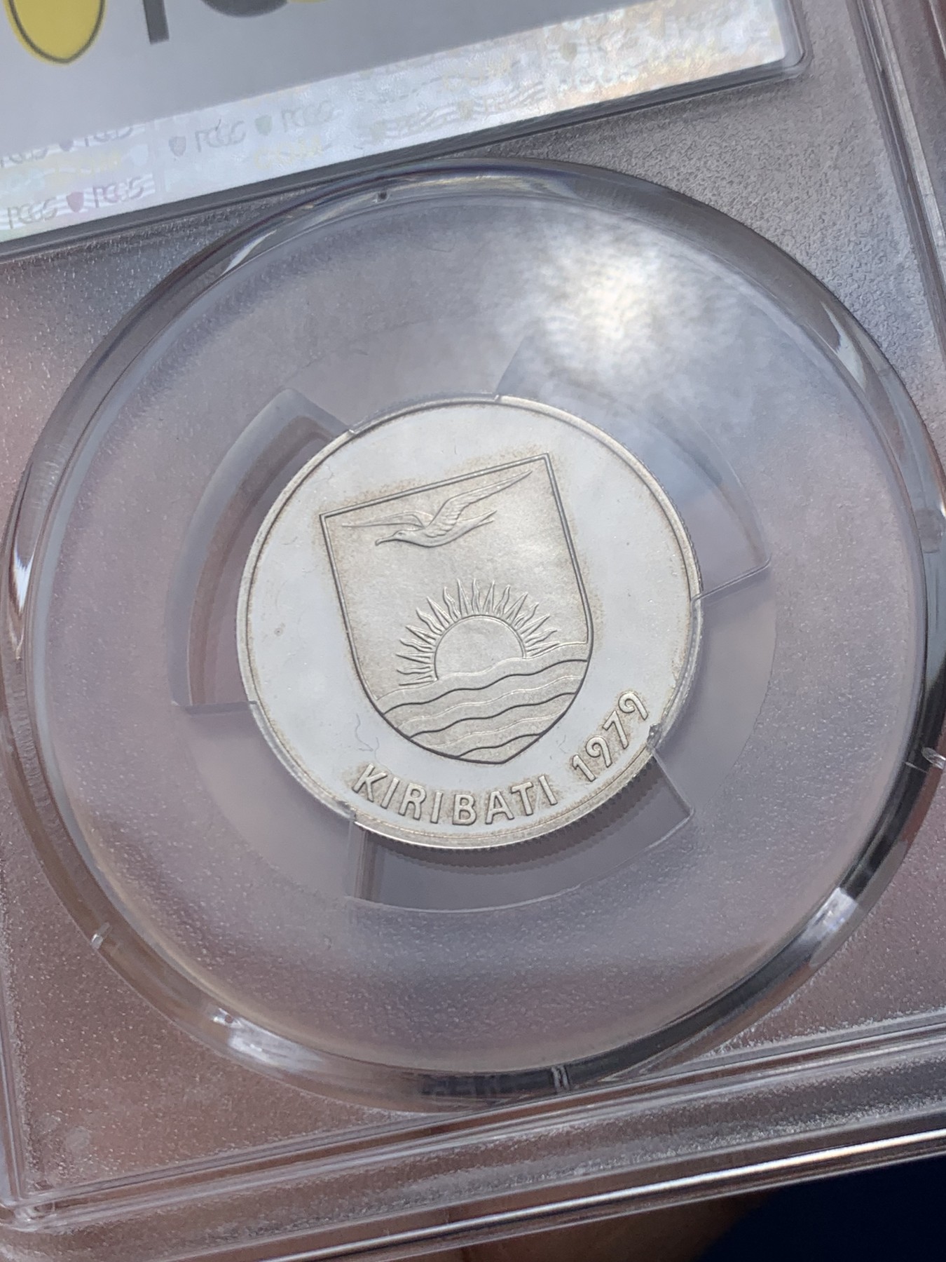 《竞宝斋》第260场-周日，周一，周二 3场连拍 (全场包邮) PCGS金盾 PR69DCAM 基里巴斯菠萝蜜1979年10分精制镍币