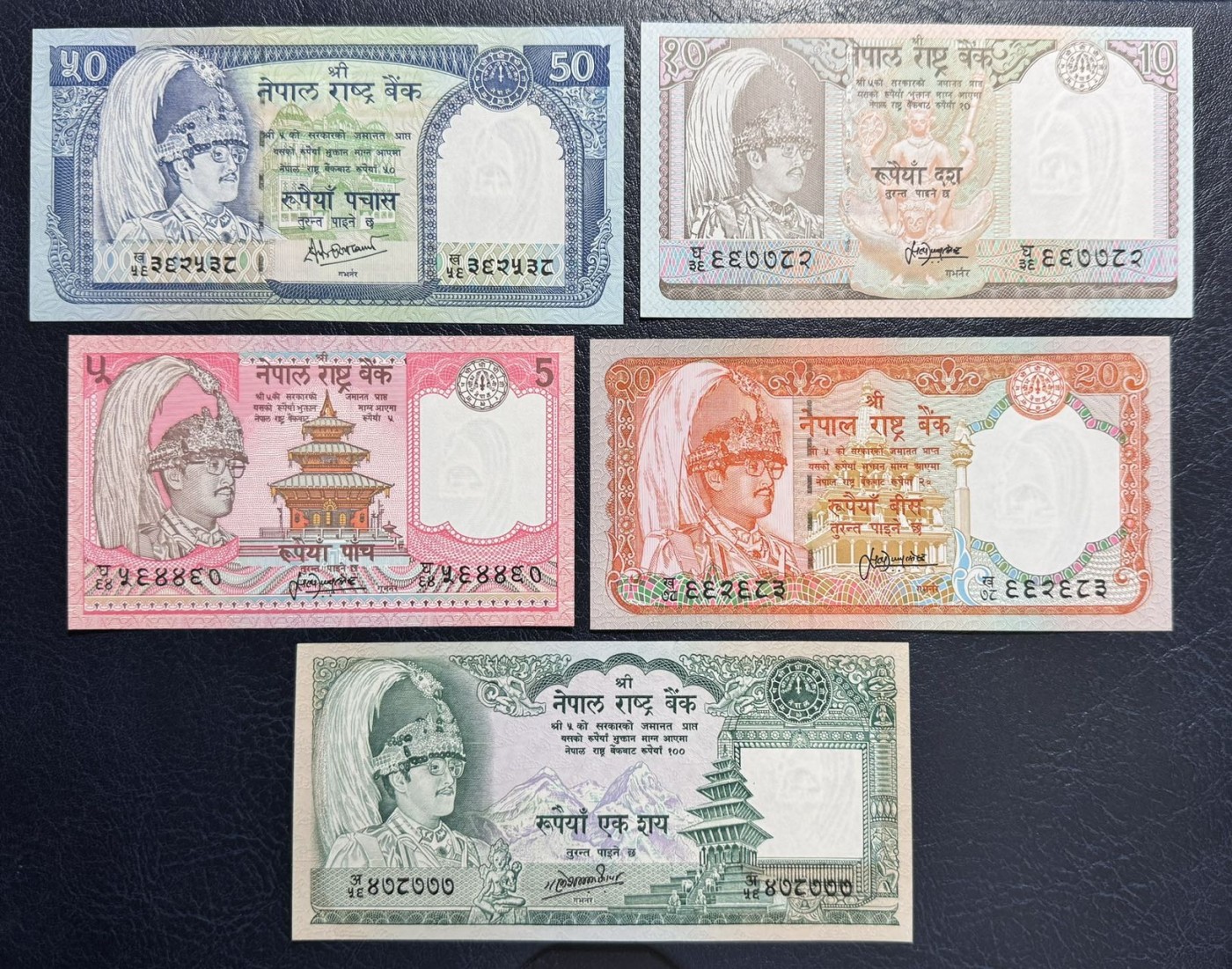 收藏联盟Quantum Auction 第340期拍卖  尼泊尔1981-2001年1到1000卢比 品相UNC 瑕疵细节如图 500有紫光斑