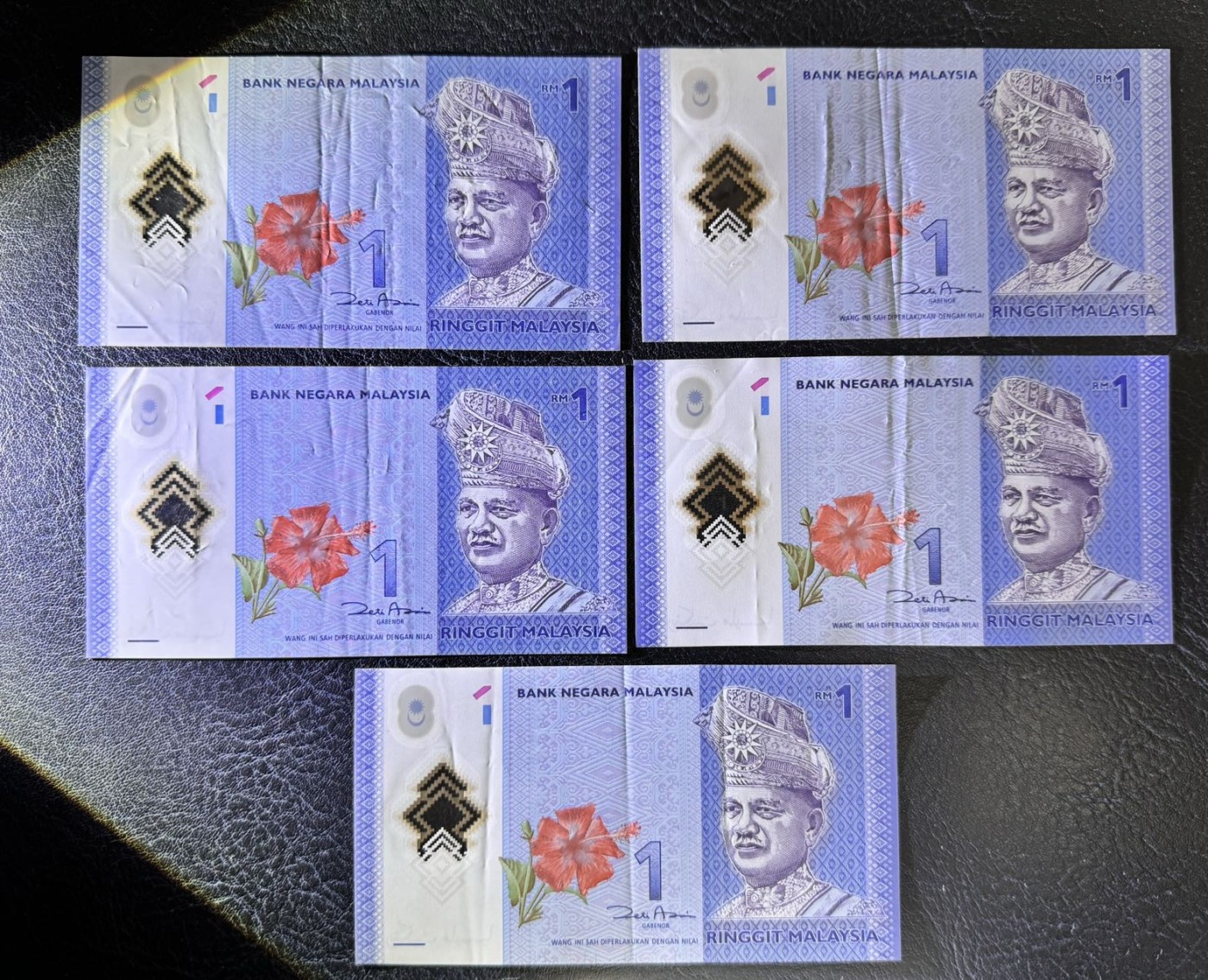 收藏联盟Quantum Auction 第340期拍卖  马来西亚1吉令特5张和5吉令特5张 品相分别为XF和全新UNC