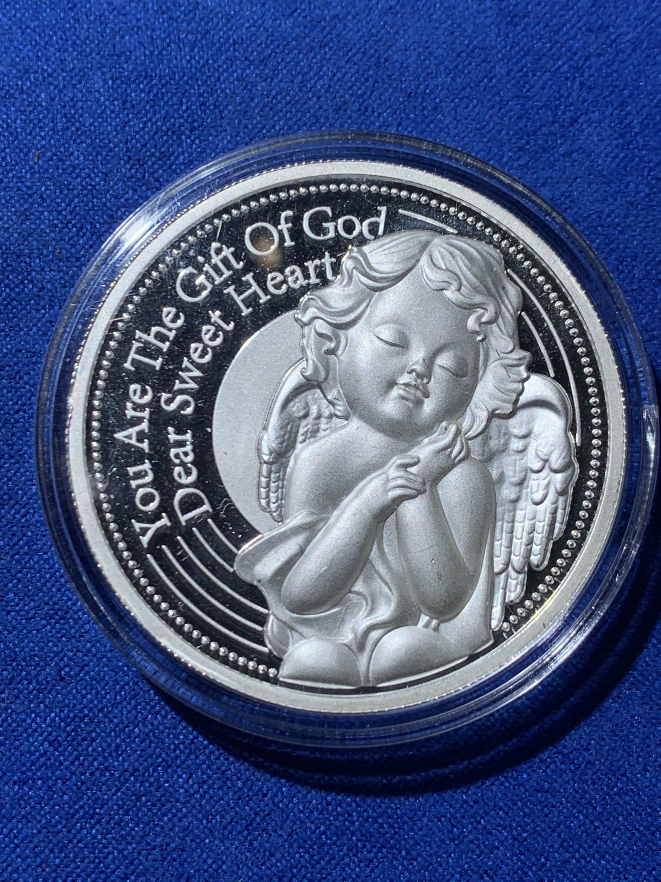 《竞宝斋》第260场-周日，周一，周二 3场连拍 (全场包邮) 天使宝宝银质纪念章 约30.3克 密度约10.4