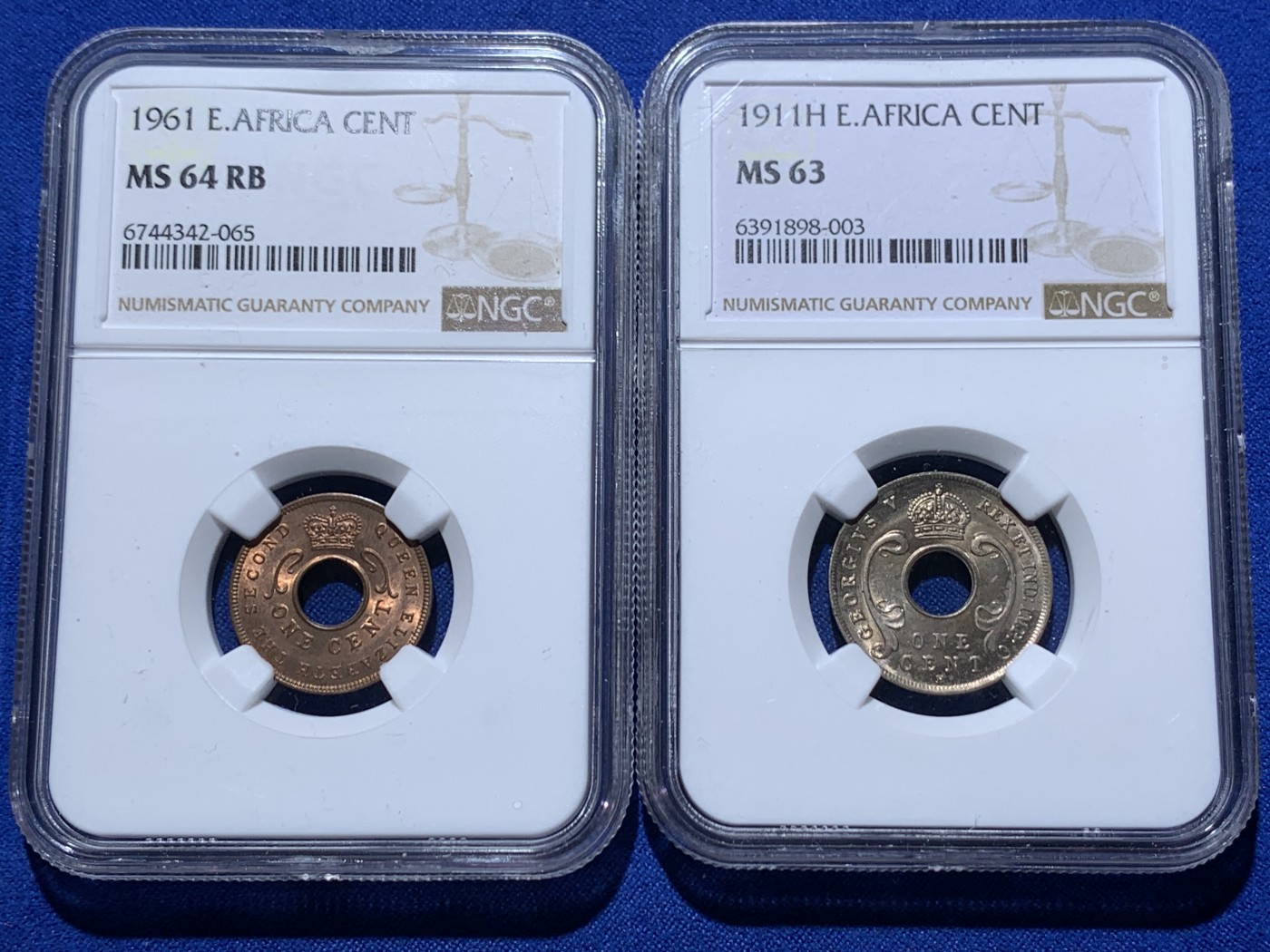 《竞宝斋》第260场-周日，周一，周二 3场连拍 (全场包邮) 两枚一组 NGC MS63/MS64RB 英属东非1911/1961年1分中孔币，从乔治五世东非乌干达保护地到伊丽莎白二世东非殖民地，相隔半个世纪的相遇