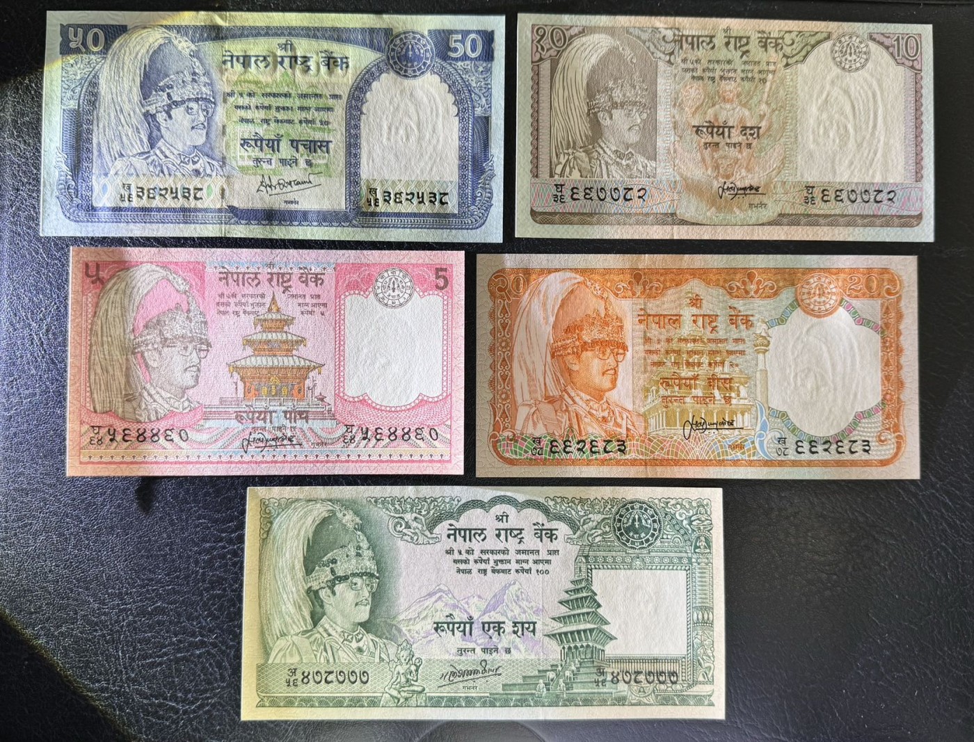 收藏联盟Quantum Auction 第340期拍卖  尼泊尔1981-2001年1到1000卢比 品相UNC 瑕疵细节如图 500有紫光斑