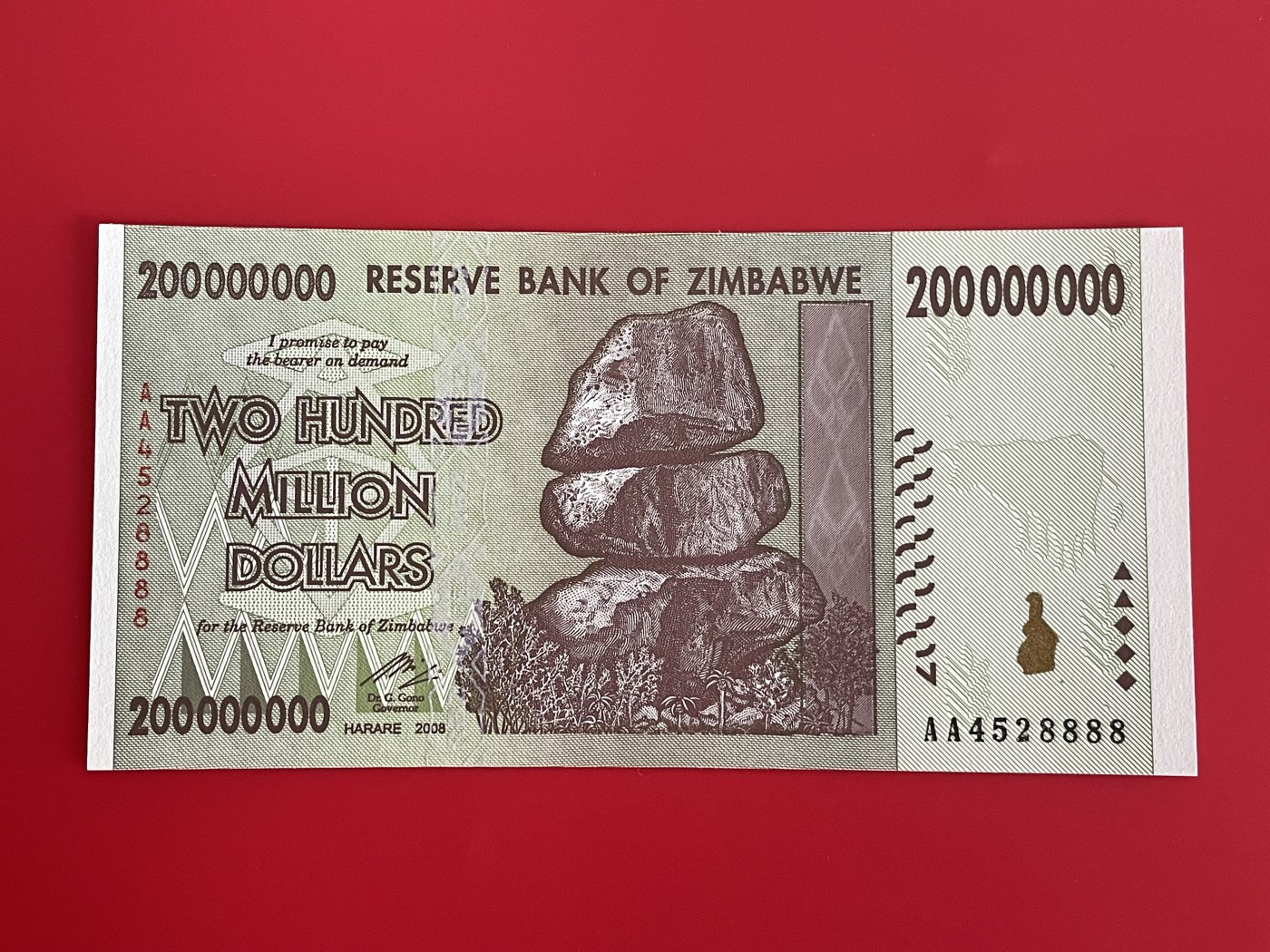 世界各国纸币、朝鲜钞、连体钞、豹子号888等靓号专场 【第四场】 金巴布韦 2008 年 2 亿元纸币 狮子号 AA4528888 全新UNC