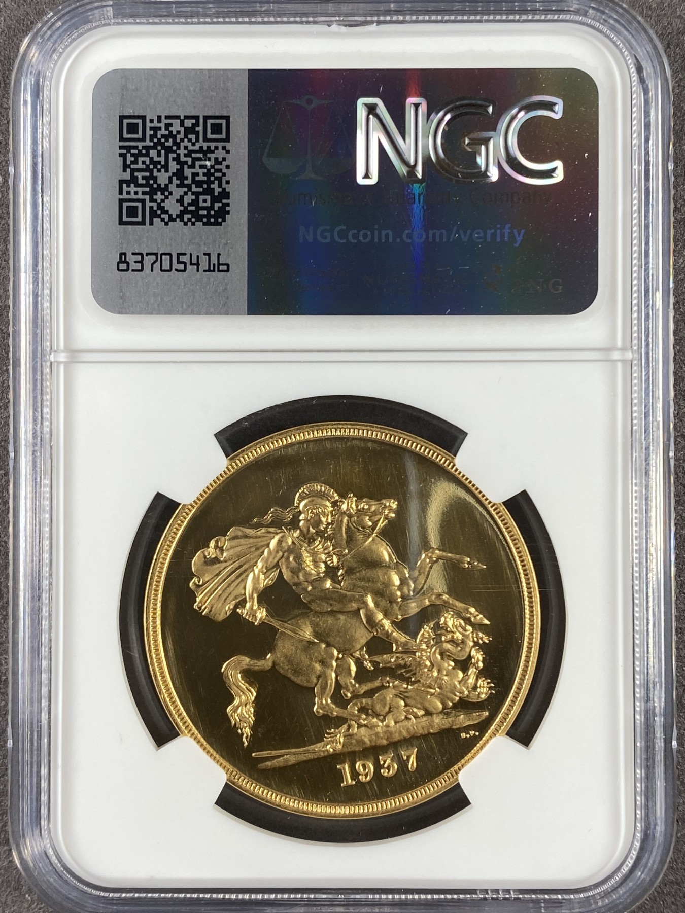 万国钱币拍卖第024期（诸神之战） NGC PF63+CAM 1937年英国乔治六世5磅马剑大金币 发行量5500枚的精制5镑品种，40g大金的手感令人无法抗拒，加上高浮雕深度镜面堪称视觉与触觉的双重享受，在黄金价格的影响下5镑大金的价格也以肉眼可见的价格上涨，不管您是英国币爱好者还是黄金爱好者，此枚高质量乔六5镑都不失为一个好选择。