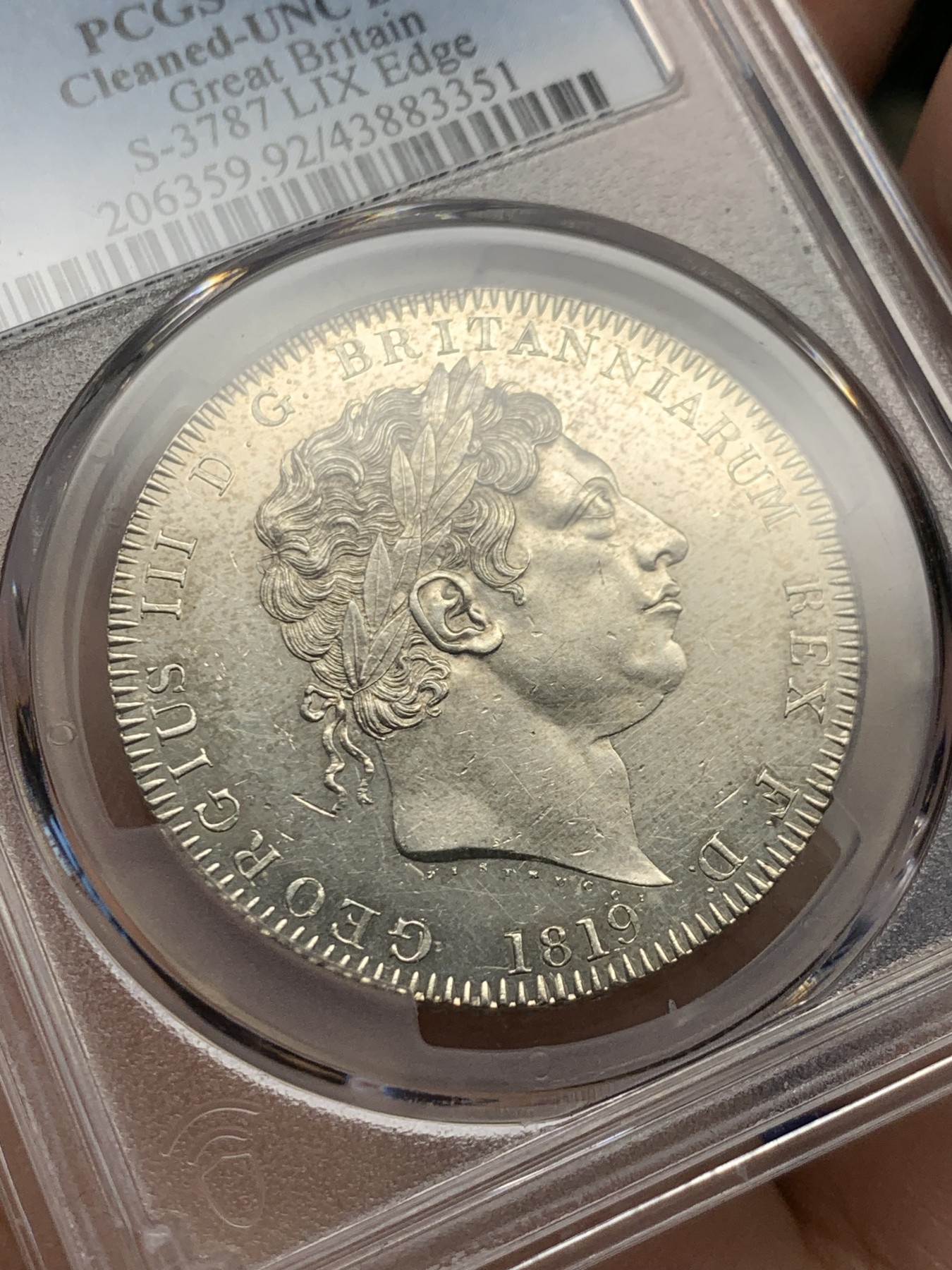 《竞宝斋》第261场-周日，周一，周二 3场连拍 (全场包邮) PCGS UNCD 1819年英国乔治三世马剑 镜面底板，所以划痕格外明显，毕竟UNC，其他细节不差的