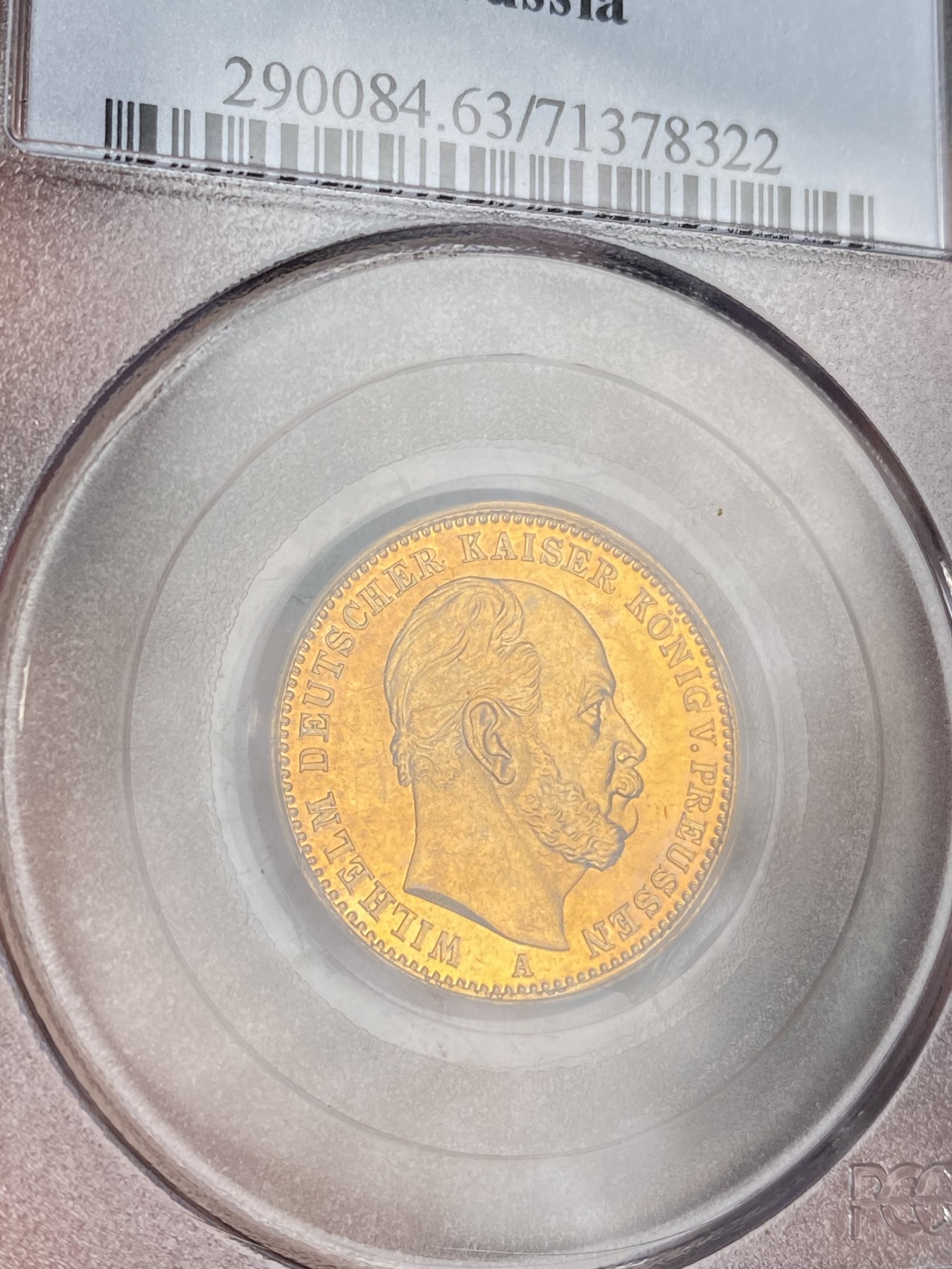 万国钱币拍卖第024期（诸神之战） PCGS MS63 1872年德国普鲁士威廉一世短翅20马克金币 经典品种配经典PC白盒，状态喜人，应该有得+，好品非常难得的短翅金马克，更高分仅9枚，7.96g，900金。