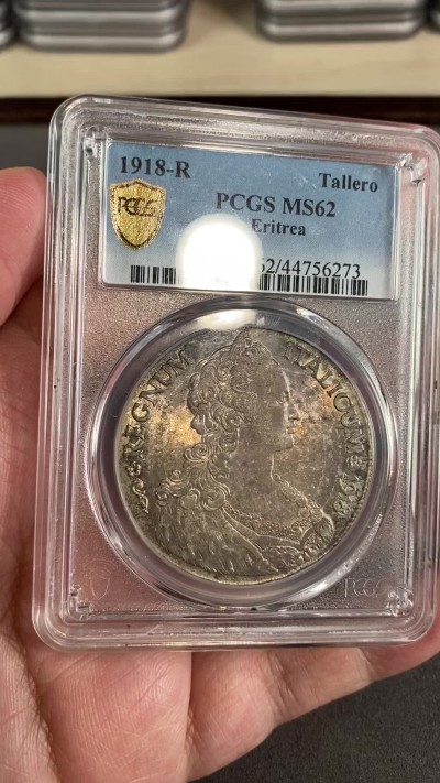 万国钱币拍卖第024期（诸神之战） PCGS MS62 1918年意属厄立特里亚1泰勒 意大利名誉品种 金彩环绕 实物状态非常炸裂 15年HA同分成交价2100美金
