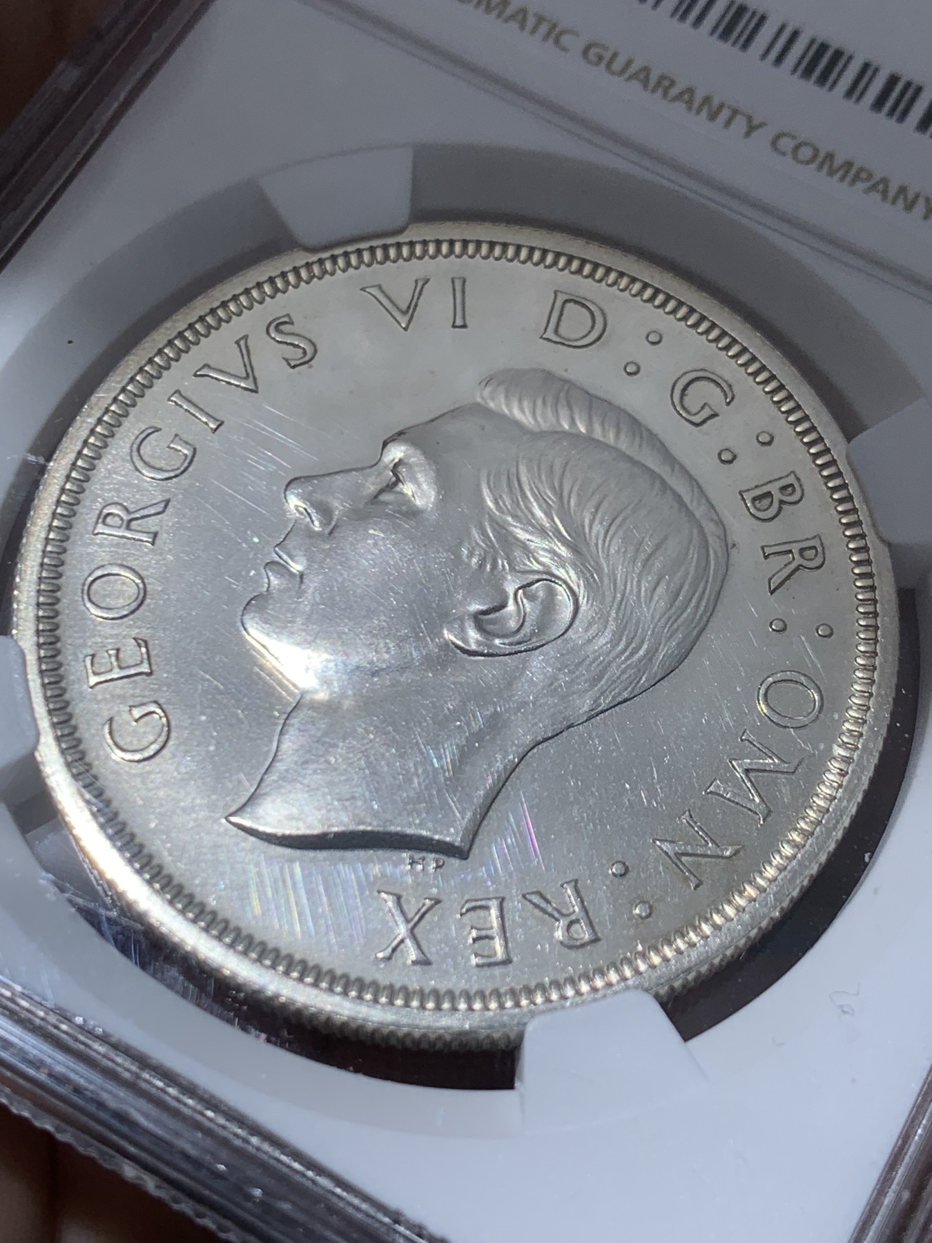 《竞宝斋》第261场-周日，周一，周二 3场连拍 (全场包邮) NGC PROOF 英国1937年乔治六世登基1克朗精制银币，PROOF精制币，车轮强转光，打制精美，高浮雕币面清爽干净又漂亮。