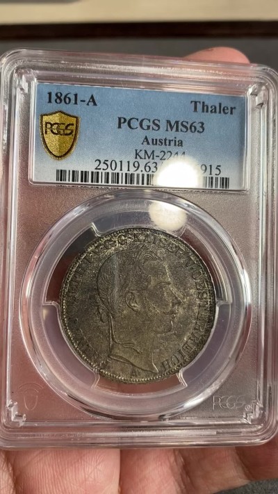 万国钱币拍卖第024期（诸神之战） PCGS MS63 1861年奥地利佛朗茨一世双头鹰流通1泰勒 PC唯一亚军分 更高分仅一枚 重五彩 属德意志联合泰勒范畴 奥地利潜力品种