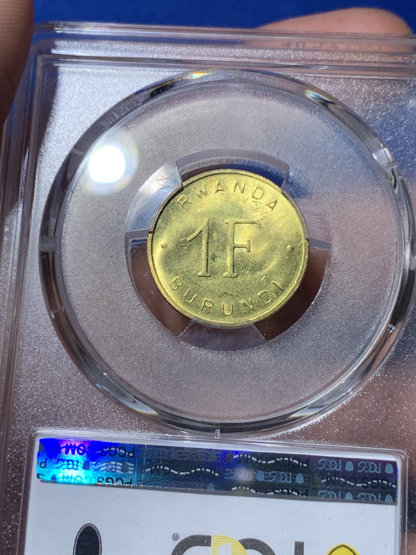 《竞宝斋》第261场-周日，周一，周二 3场连拍 (全场包邮) PCGS金盾 MS64 卢旺达-布隆迪雄狮1961年1法郎铜币