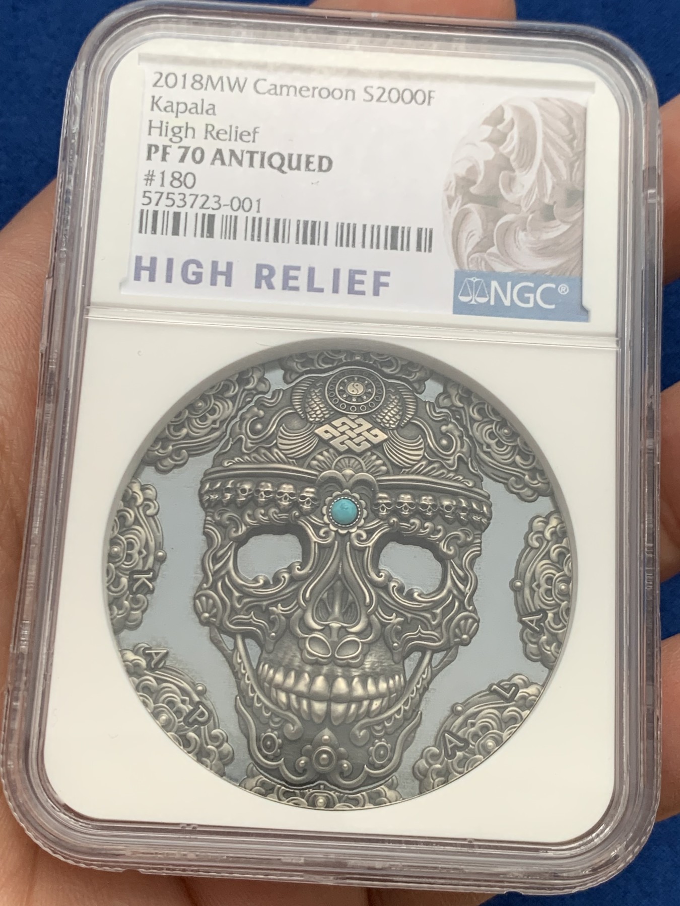 《竞宝斋》第261场-周日，周一，周二 3场连拍 (全场包邮) NGC PF70 喀麦隆2018卡帕拉头盖镶嵌绿松石 2盎司 银币 180 高浮雕标 盒证齐全 镶嵌工艺 世界文化系列首枚