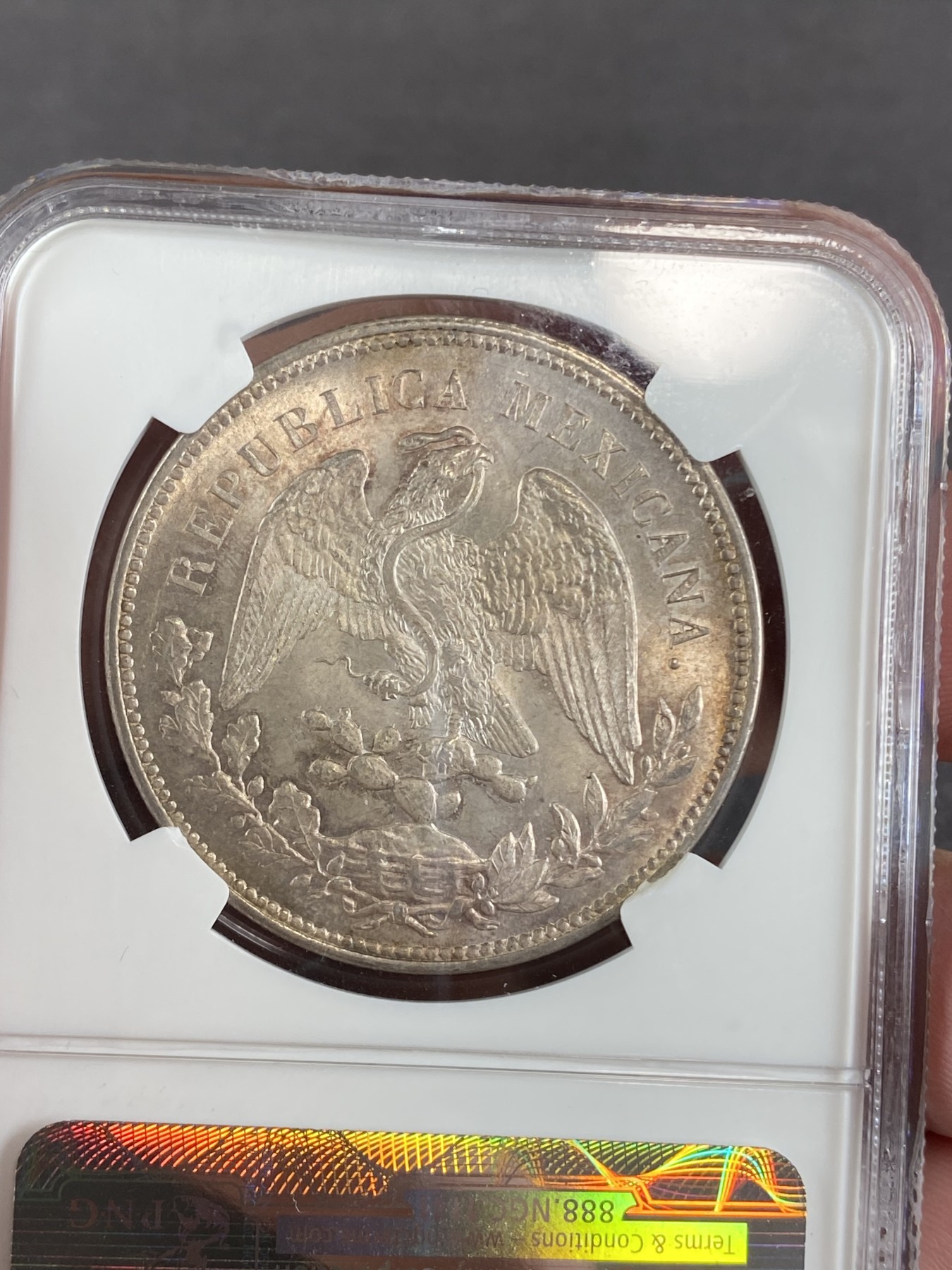 万国钱币拍卖第024期（诸神之战） NGC MS65 1909年墨西哥MO厂直边鹰洋1比索 超级原光原味状态，BU状态，NGC老盒，更高分仅5枚。