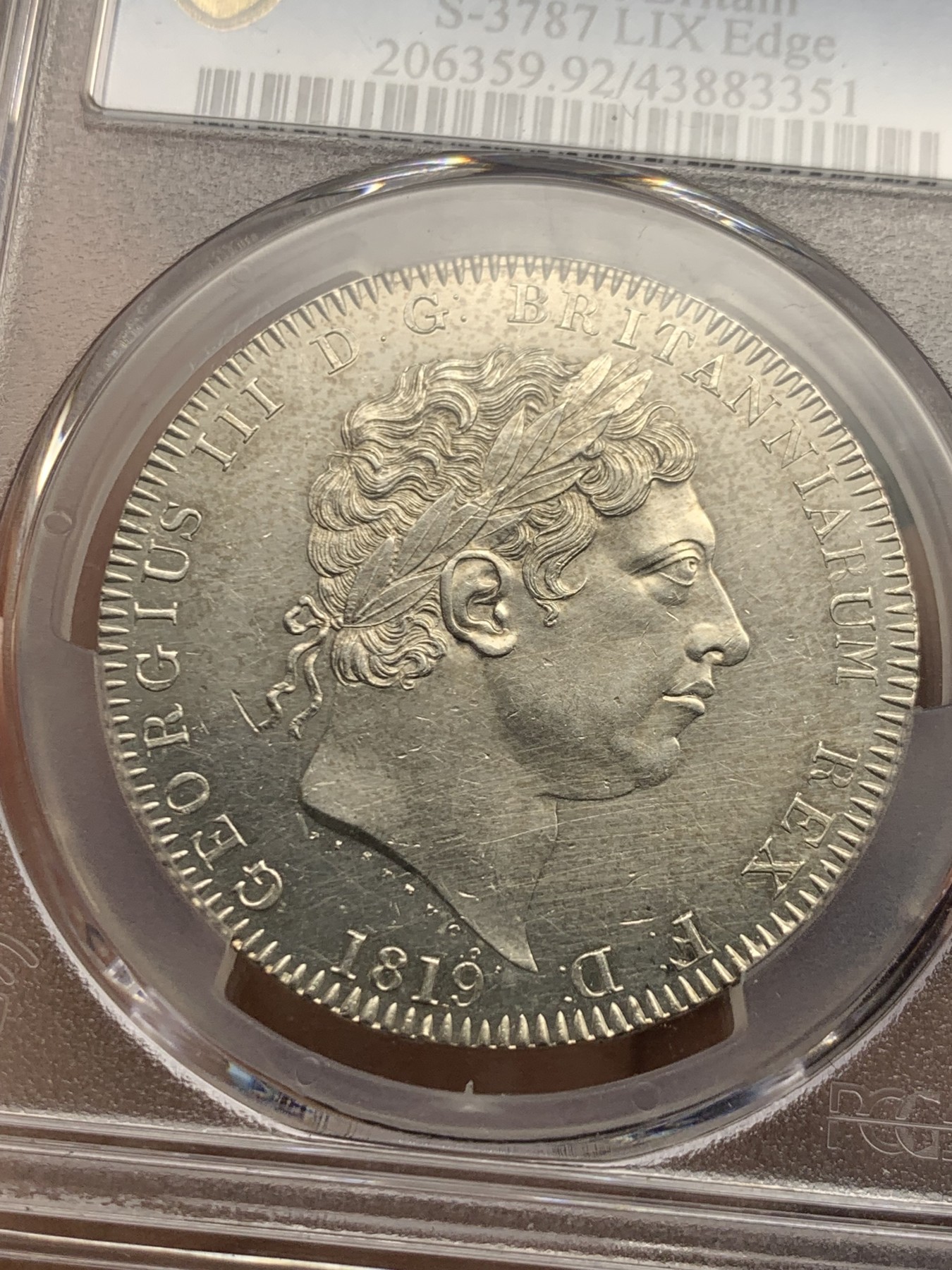 《竞宝斋》第261场-周日，周一，周二 3场连拍 (全场包邮) PCGS UNCD 1819年英国乔治三世马剑 镜面底板，所以划痕格外明显，毕竟UNC，其他细节不差的