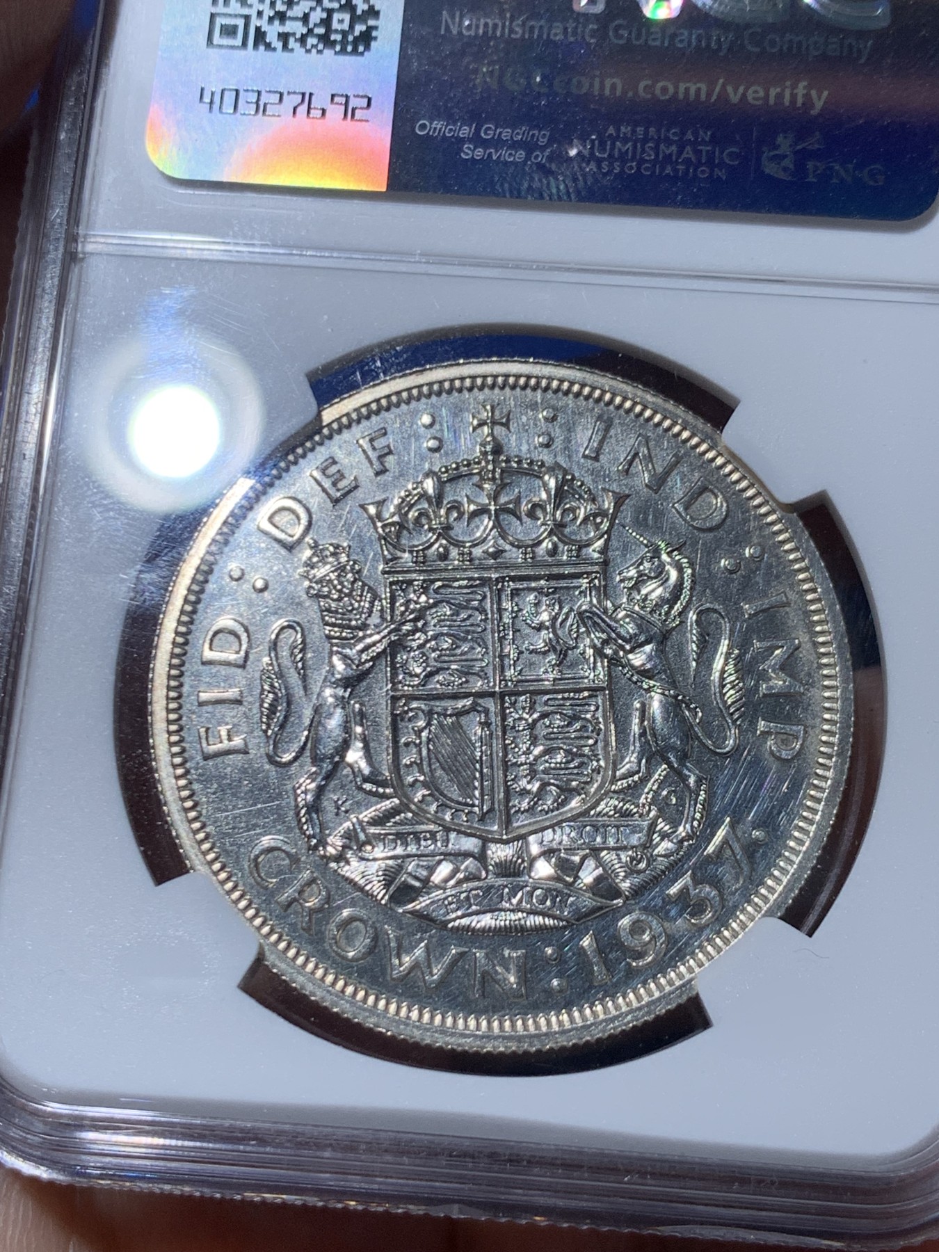 《竞宝斋》第261场-周日，周一，周二 3场连拍 (全场包邮) NGC PROOF 英国1937年乔治六世登基1克朗精制银币，PROOF精制币，车轮强转光，打制精美，高浮雕币面清爽干净又漂亮。