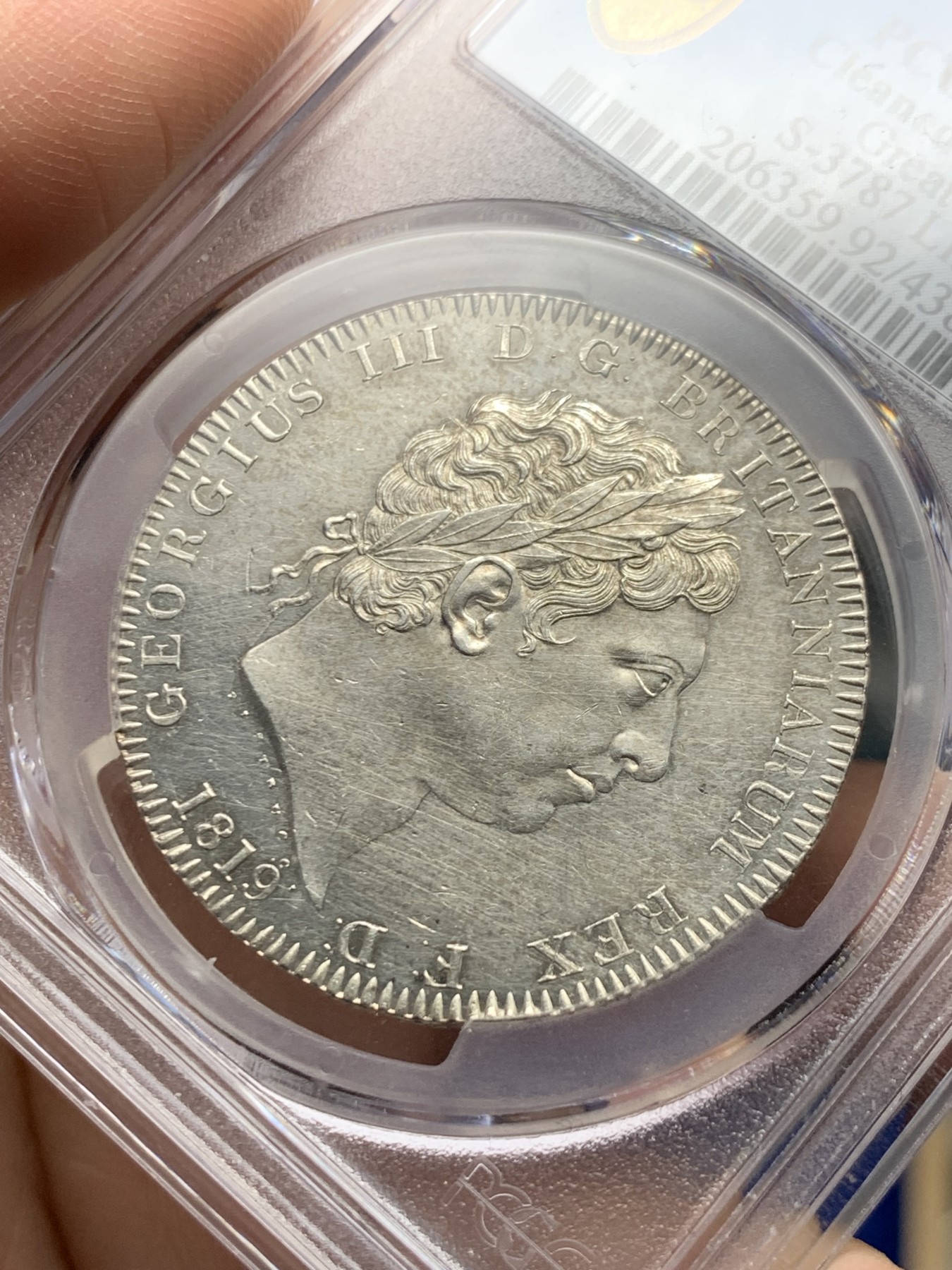 《竞宝斋》第261场-周日，周一，周二 3场连拍 (全场包邮) PCGS UNCD 1819年英国乔治三世马剑 镜面底板，所以划痕格外明显，毕竟UNC，其他细节不差的