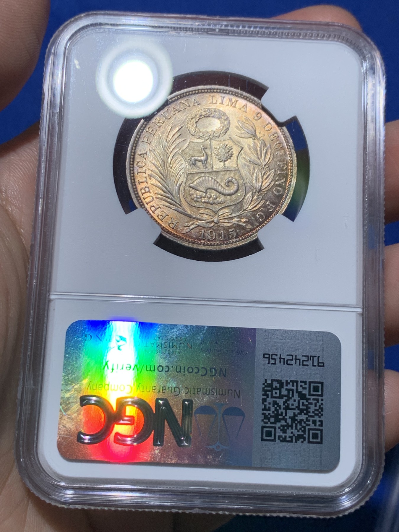 《竞宝斋》第261场-周日，周一，周二 3场连拍 (全场包邮) NGC MS64 秘鲁 1915年 1/2比索 银币 高银版 状态极好 刷双面金色包浆 高分不易