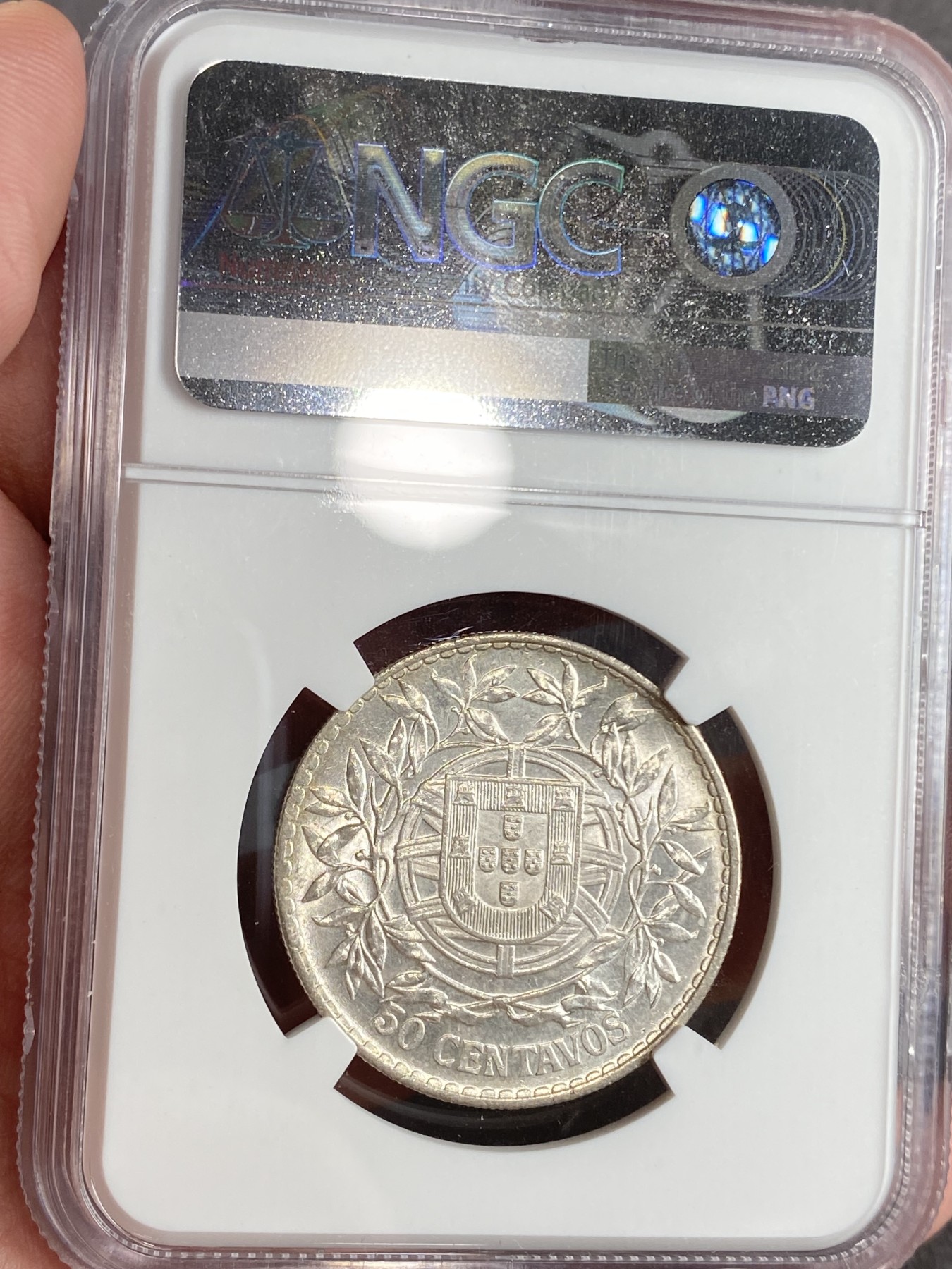万国钱币拍卖第024期（诸神之战） NGC MS62 1916年葡萄牙50分流通银币 淡金彩裹身