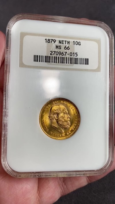 万国钱币拍卖第024期（诸神之战） NGC MS66 1879年荷兰王国威廉三世10盾金币 顶级品相 金光灿灿 6.73g，900金。