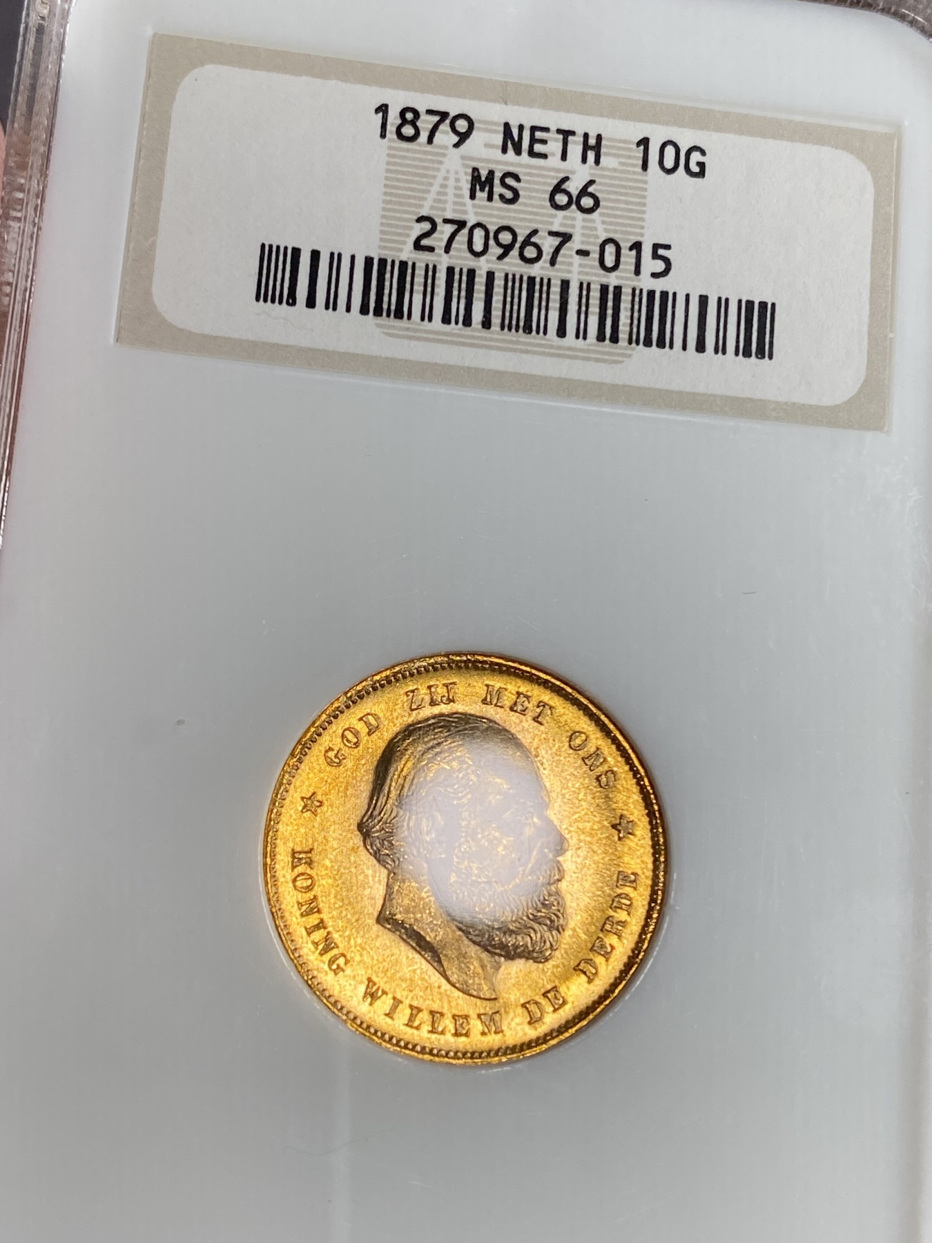 万国钱币拍卖第024期（诸神之战） NGC MS66 1879年荷兰王国威廉三世10盾金币 顶级品相 金光灿灿 6.73g，900金。