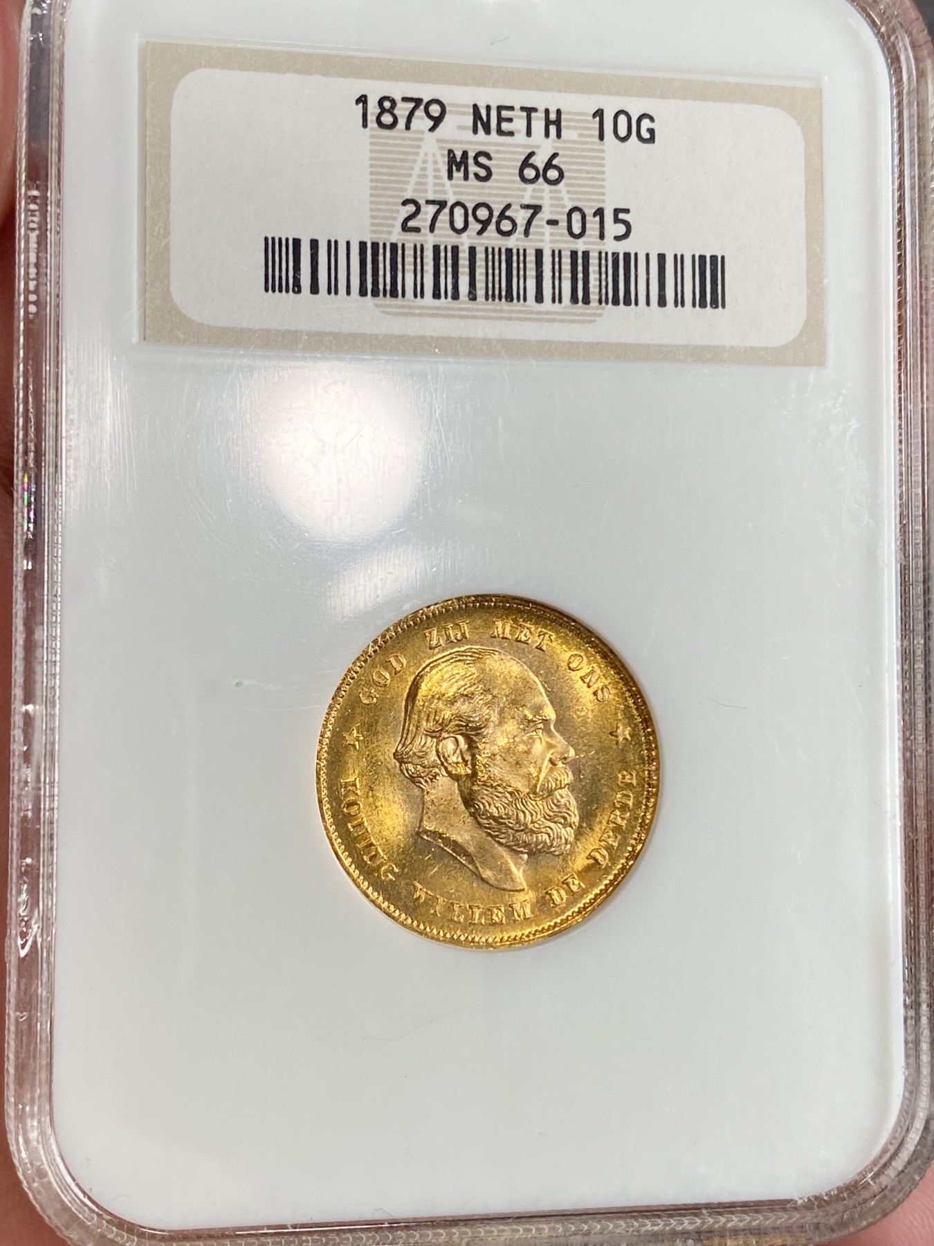 万国钱币拍卖第024期（诸神之战） NGC MS66 1879年荷兰王国威廉三世10盾金币 顶级品相 金光灿灿 6.73g，900金。