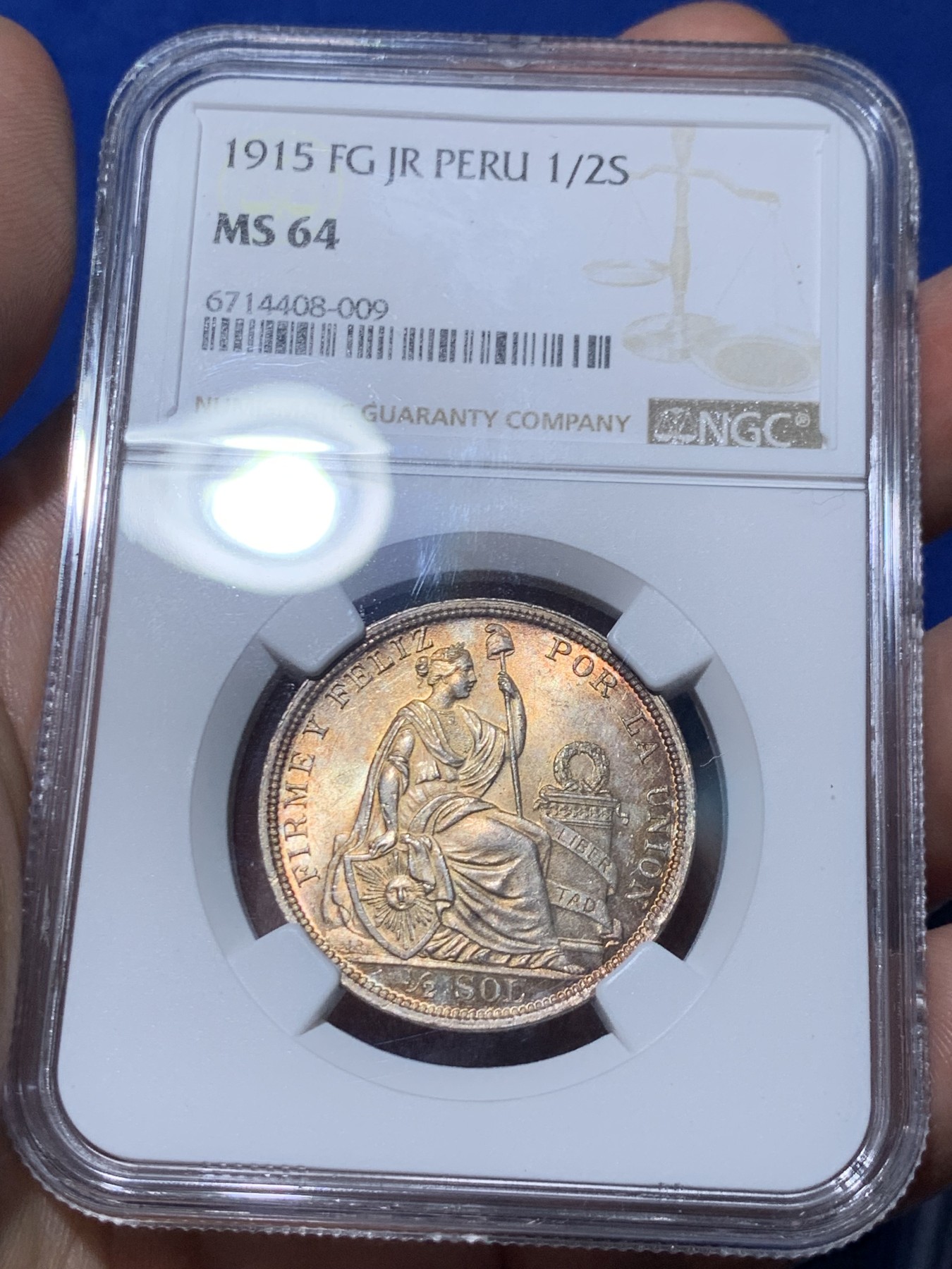 《竞宝斋》第261场-周日，周一，周二 3场连拍 (全场包邮) NGC MS64 秘鲁 1915年 1/2比索 银币 高银版 状态极好 刷双面金色包浆 高分不易