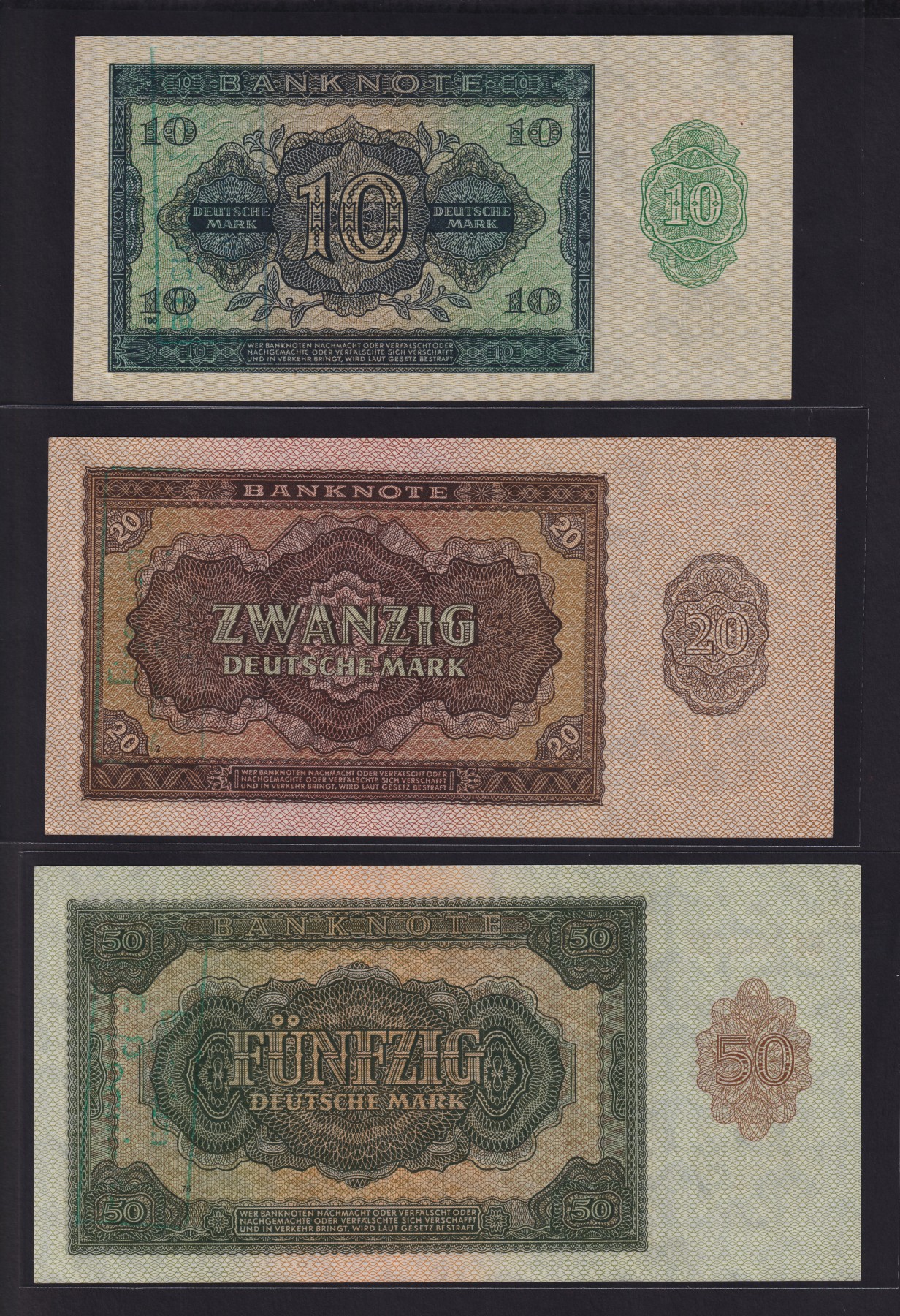 草稿银行第十九期国内外钞票拍卖 民主德国1948年10 20 50马克 民主德国代印 全新品相 库存冠 有点钞痕和银行注销章