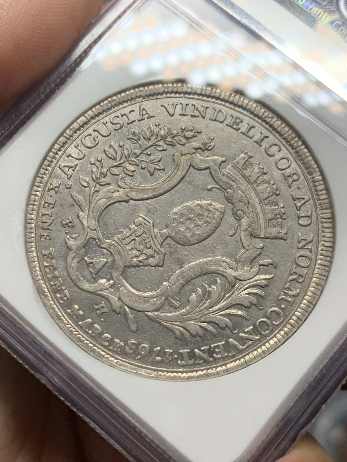 《竞宝斋》第261场-周日，周一，周二 3场连拍 (全场包邮) NGC AUD 1765年德国奥格斯堡1泰勒银币 背逆 这个少见城邦与年份