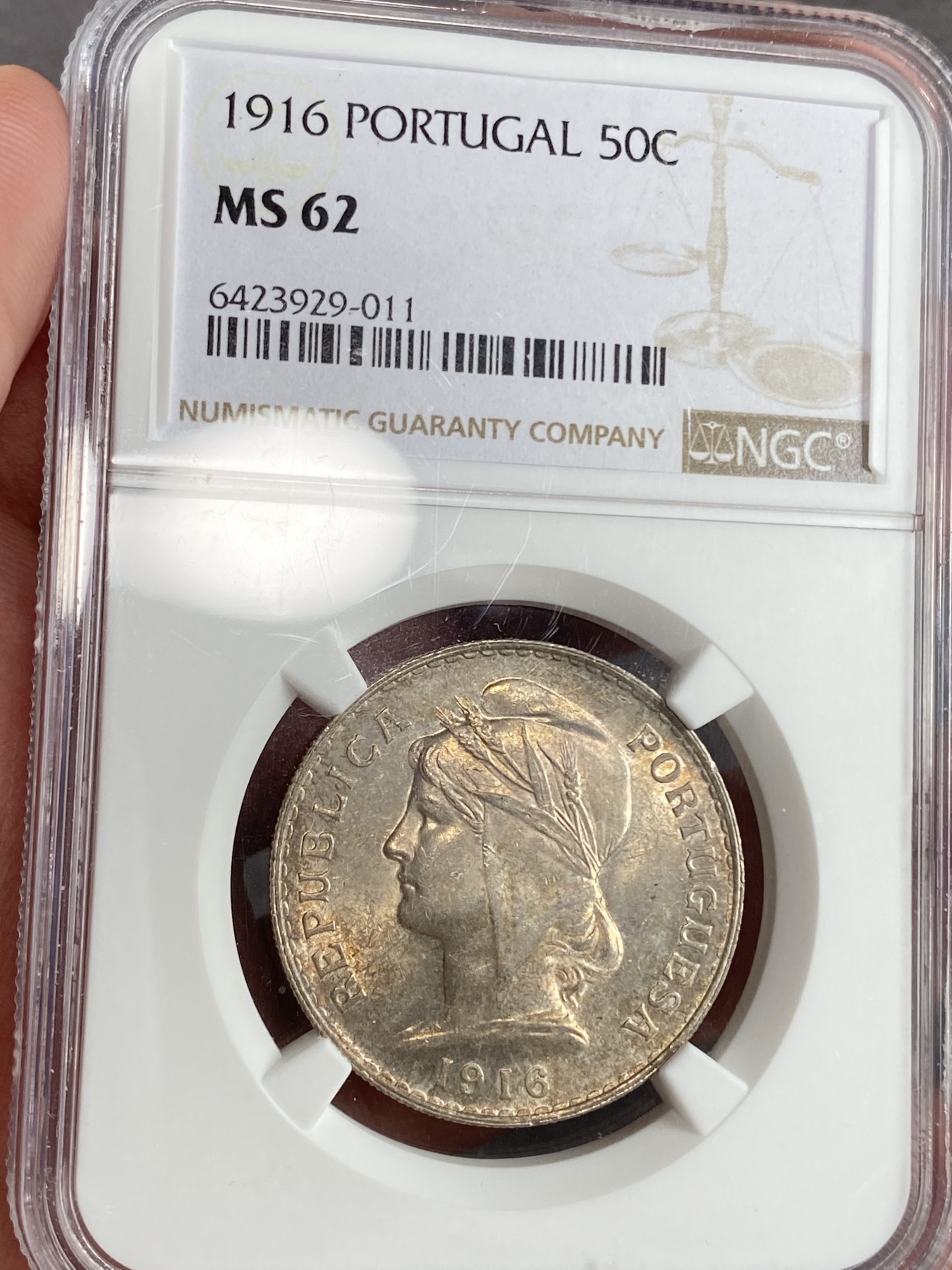 万国钱币拍卖第024期（诸神之战） NGC MS62 1916年葡萄牙50分流通银币 淡金彩裹身