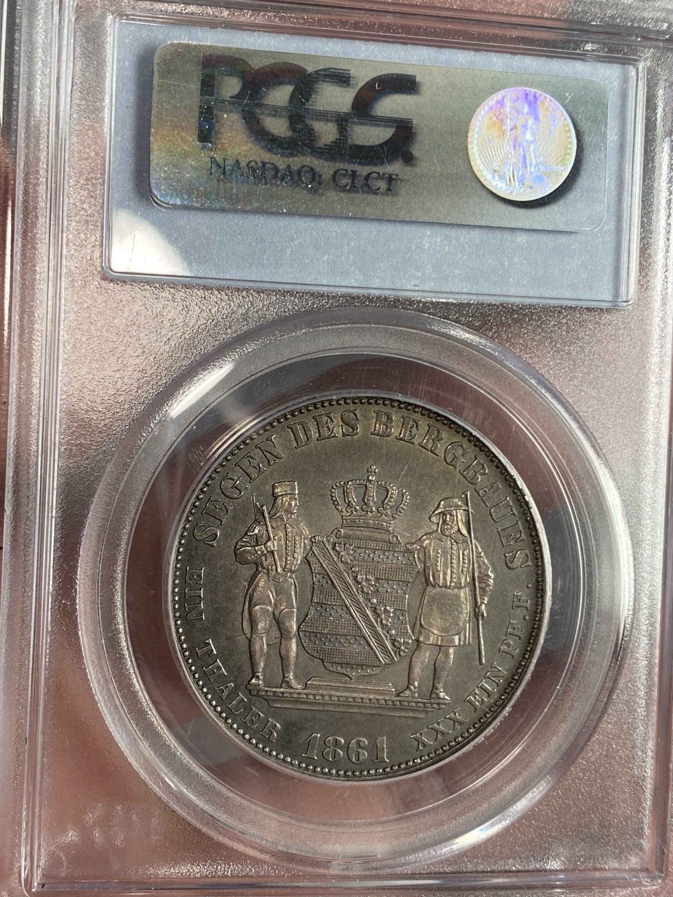 万国钱币拍卖第024期（诸神之战） PCGS MS64 1861年德国萨克森矿业祈祷流通1泰勒 均匀的酱彩包浆 经典的PC小白盒